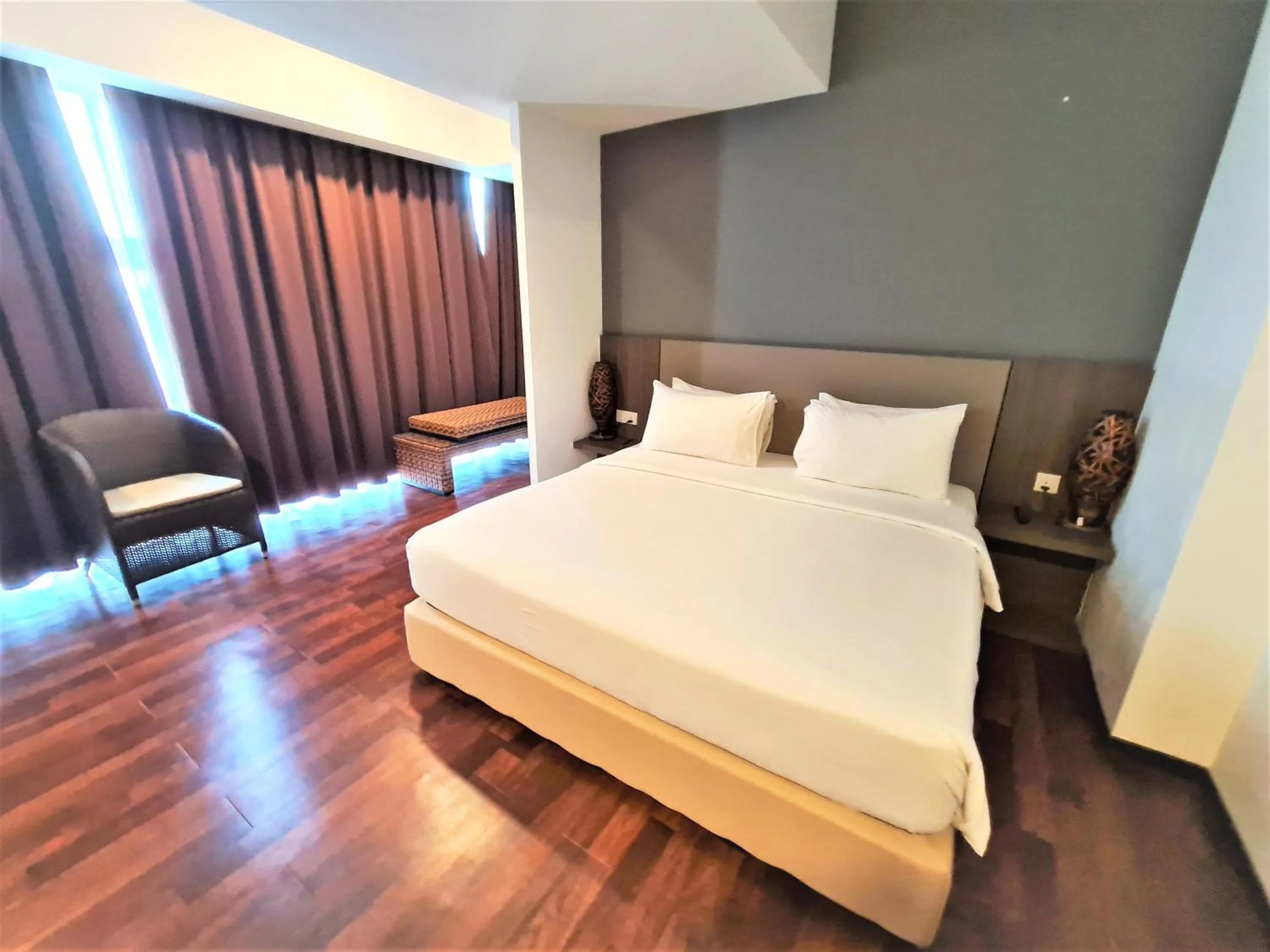 Bed in Nexus Business Suite Hotel