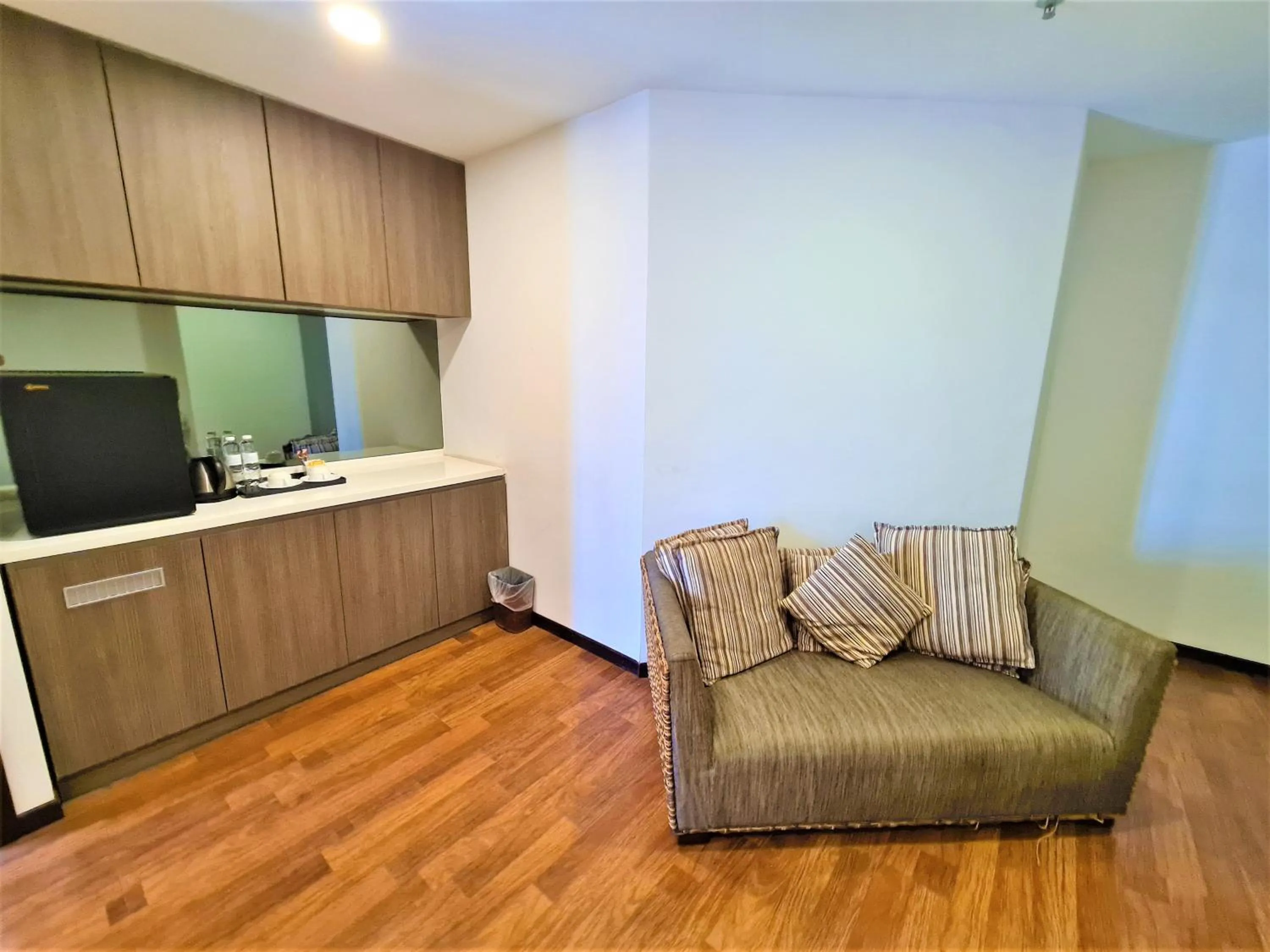 Seating area in Nexus Business Suite Hotel