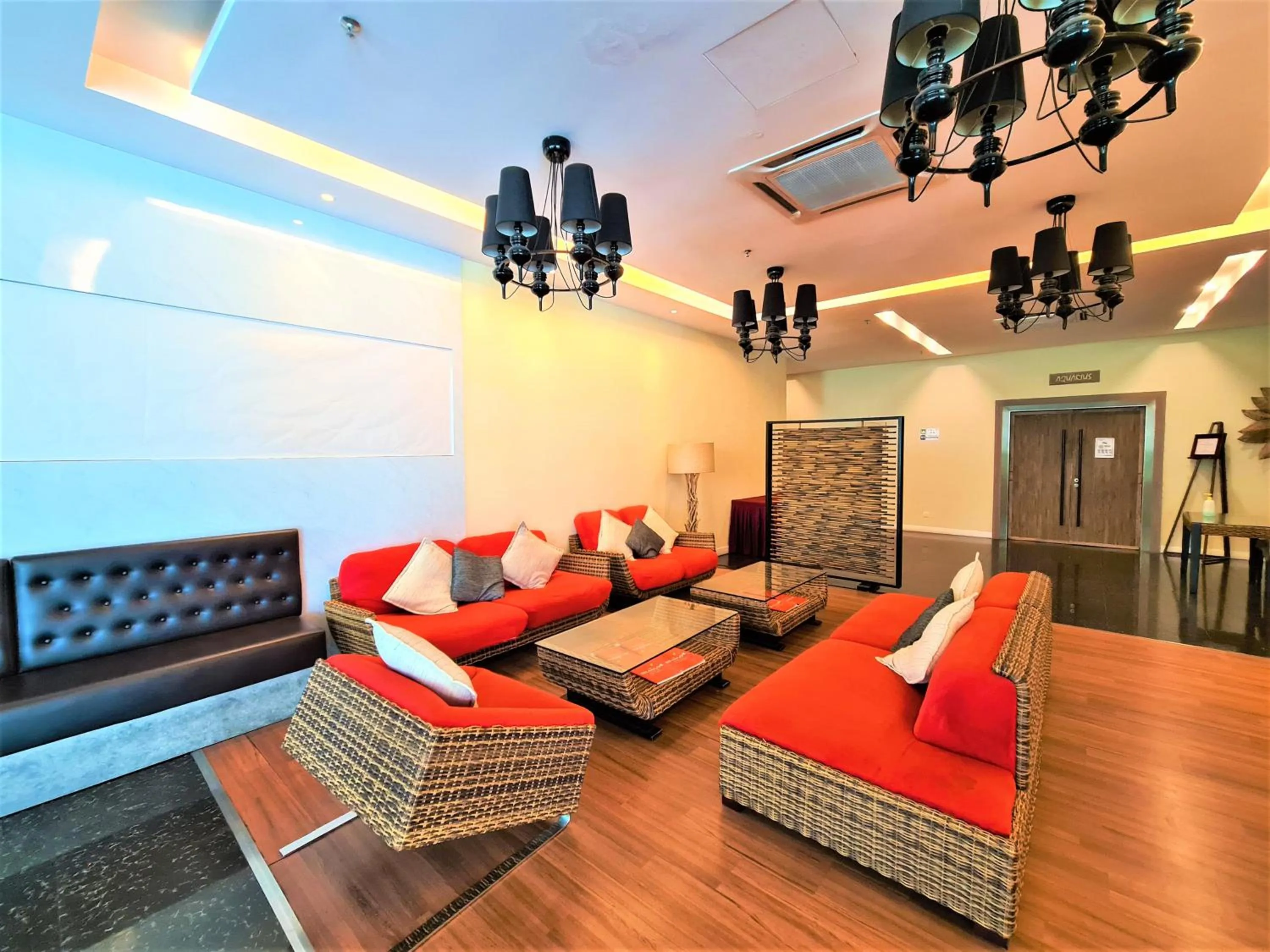 Seating area in Nexus Business Suite Hotel