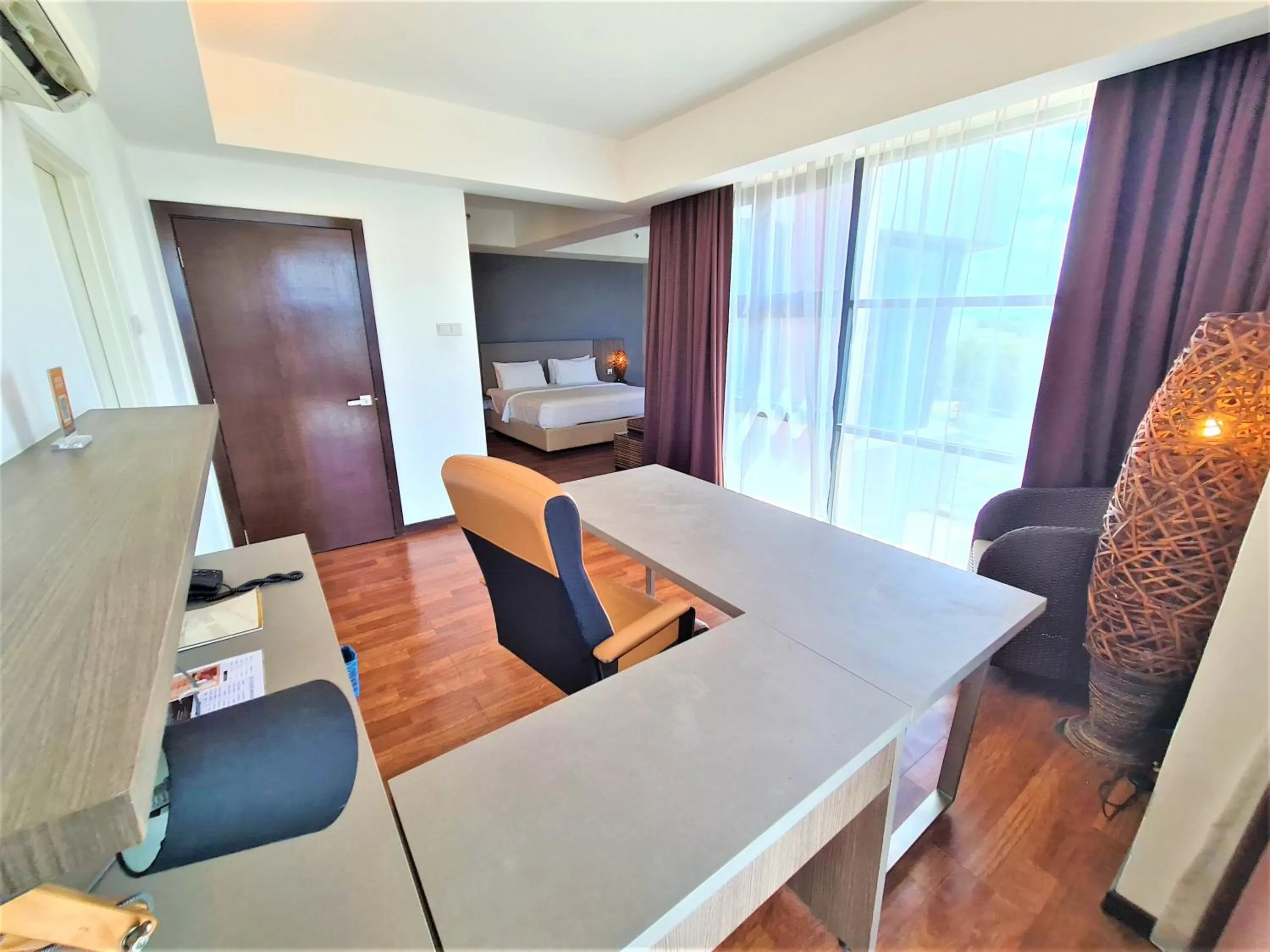 Seating area in Nexus Business Suite Hotel