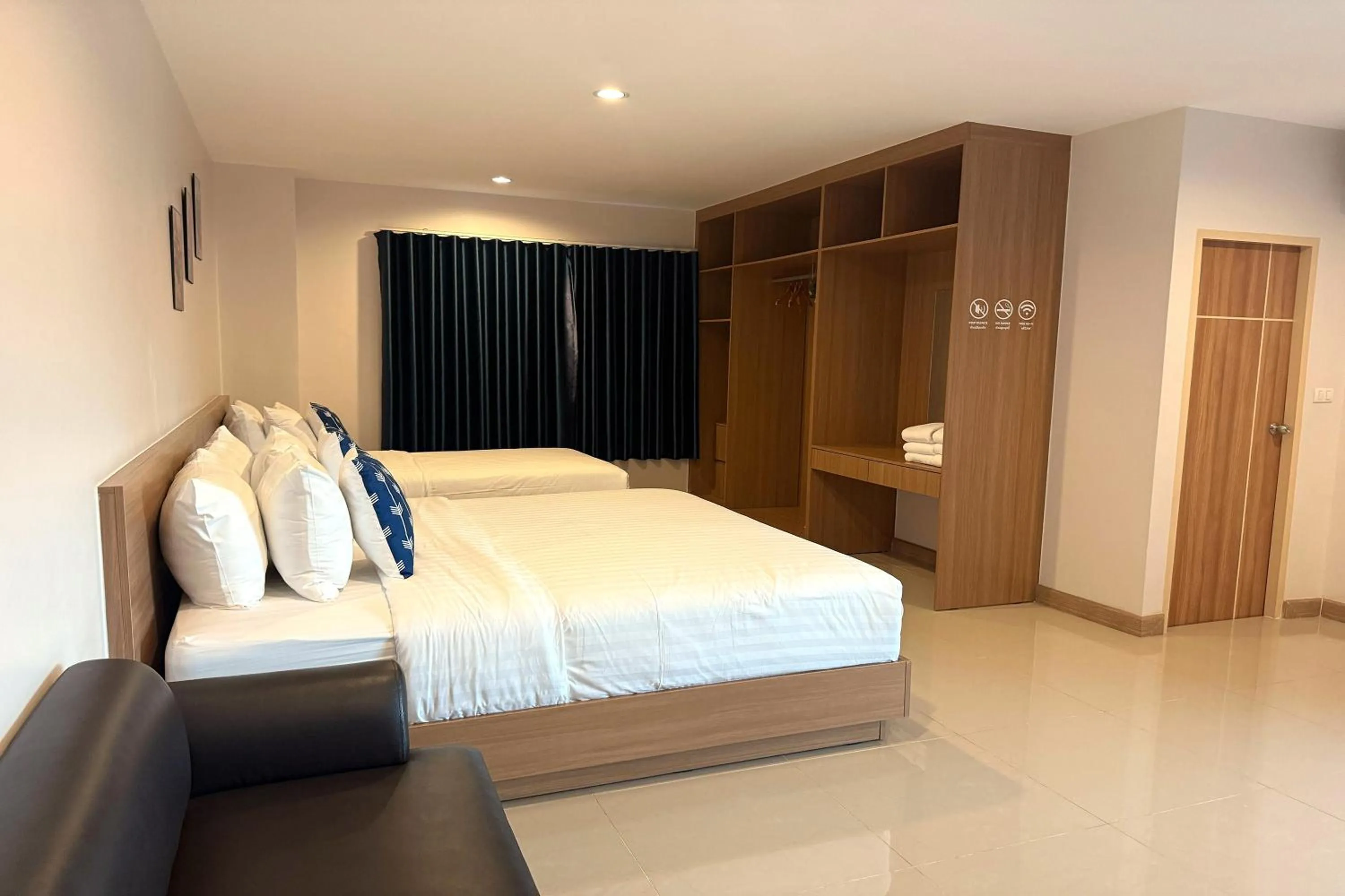 Photo of the whole room, Bed in SKM Paradise Mae Sai