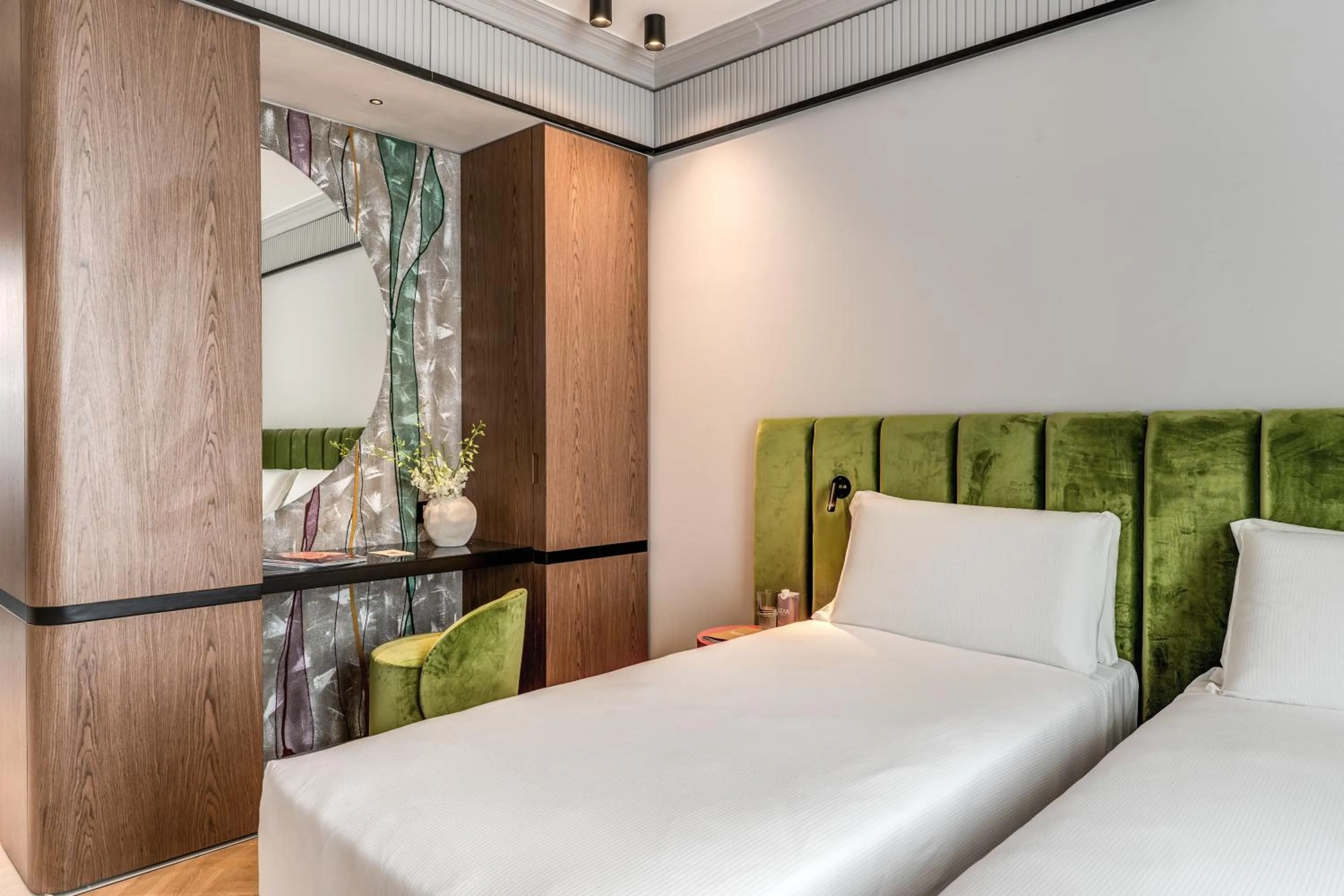 Bed in Prassede Boutique Hotel