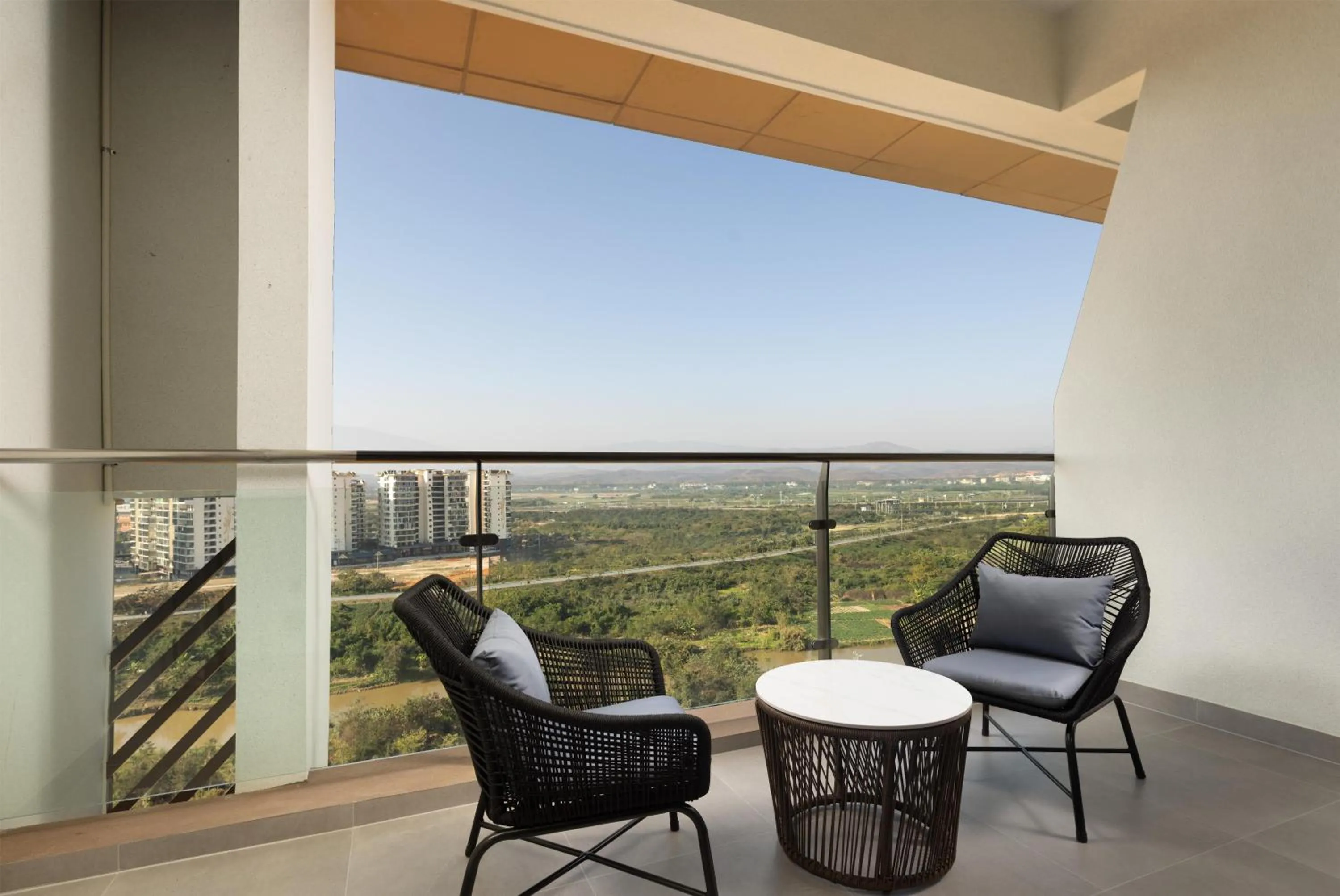 Twin Room with Pool View in Hilton Garden Inn Xishuangbanna Gasa Airport