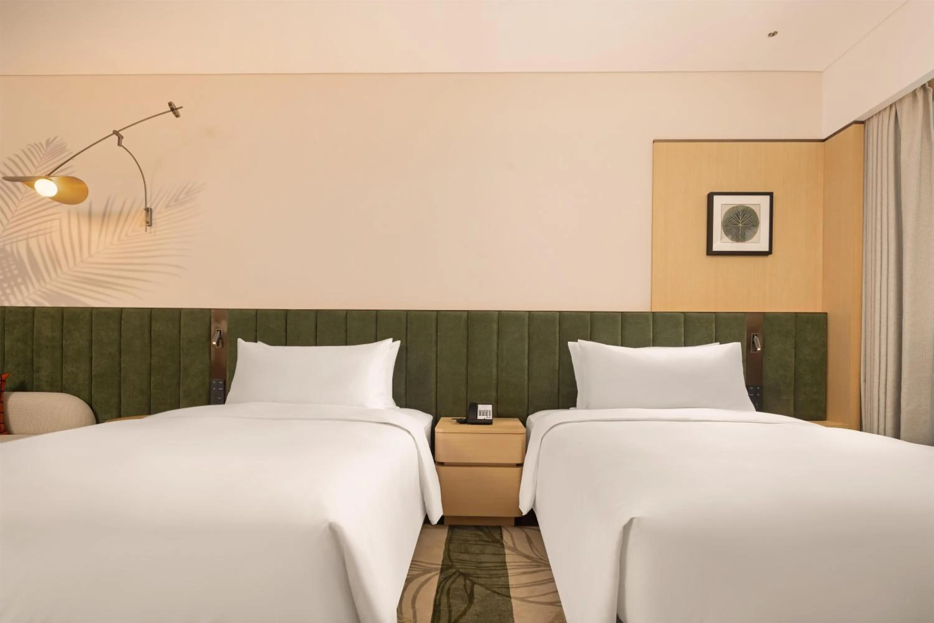 Twin Guest Room with Garden View in Hilton Garden Inn Xishuangbanna Gasa Airport