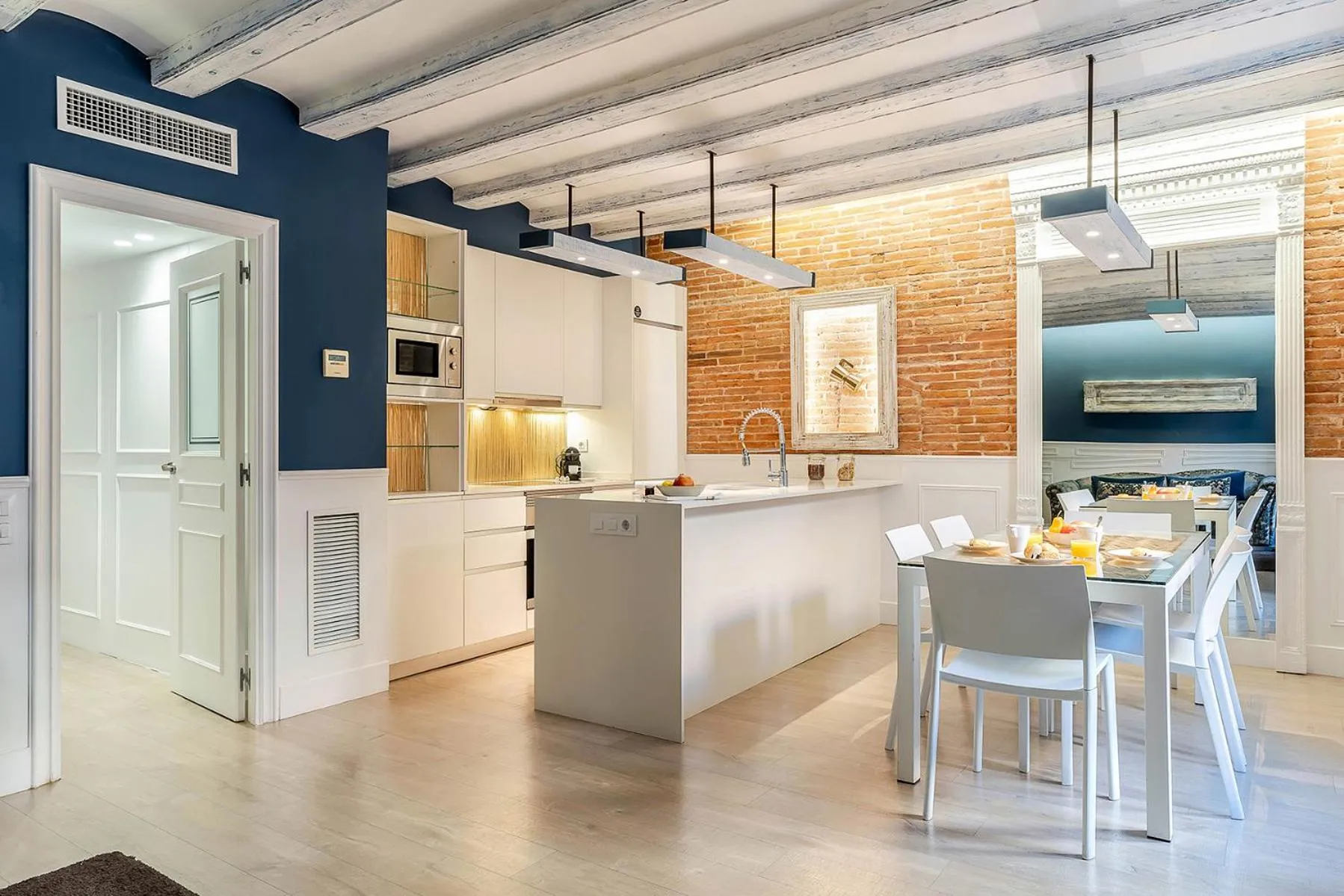 Kitchen or kitchenette in Enjoybcn Colon Apartments