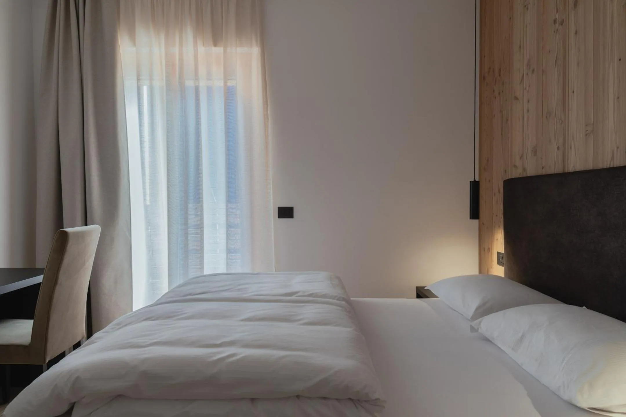 Quadruple Room in Hotel Chalet Rezia