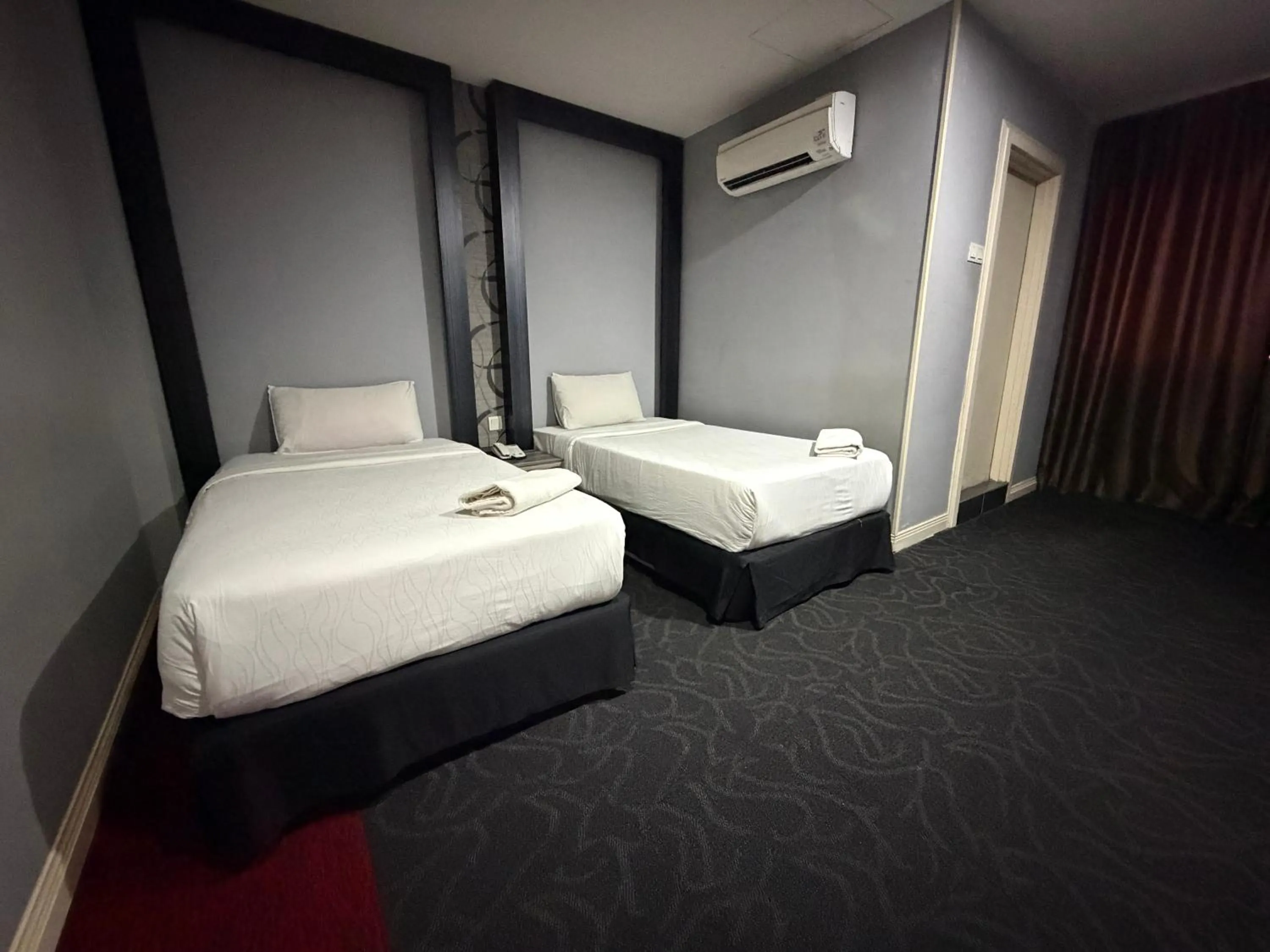 Bed in Asto Hotel Kuala Lumpur