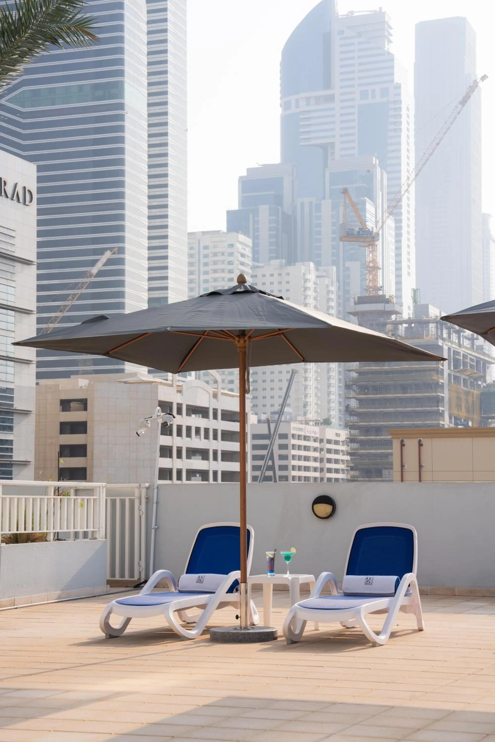 Swimming pool in The Luxe Retreat Hotel Apartments