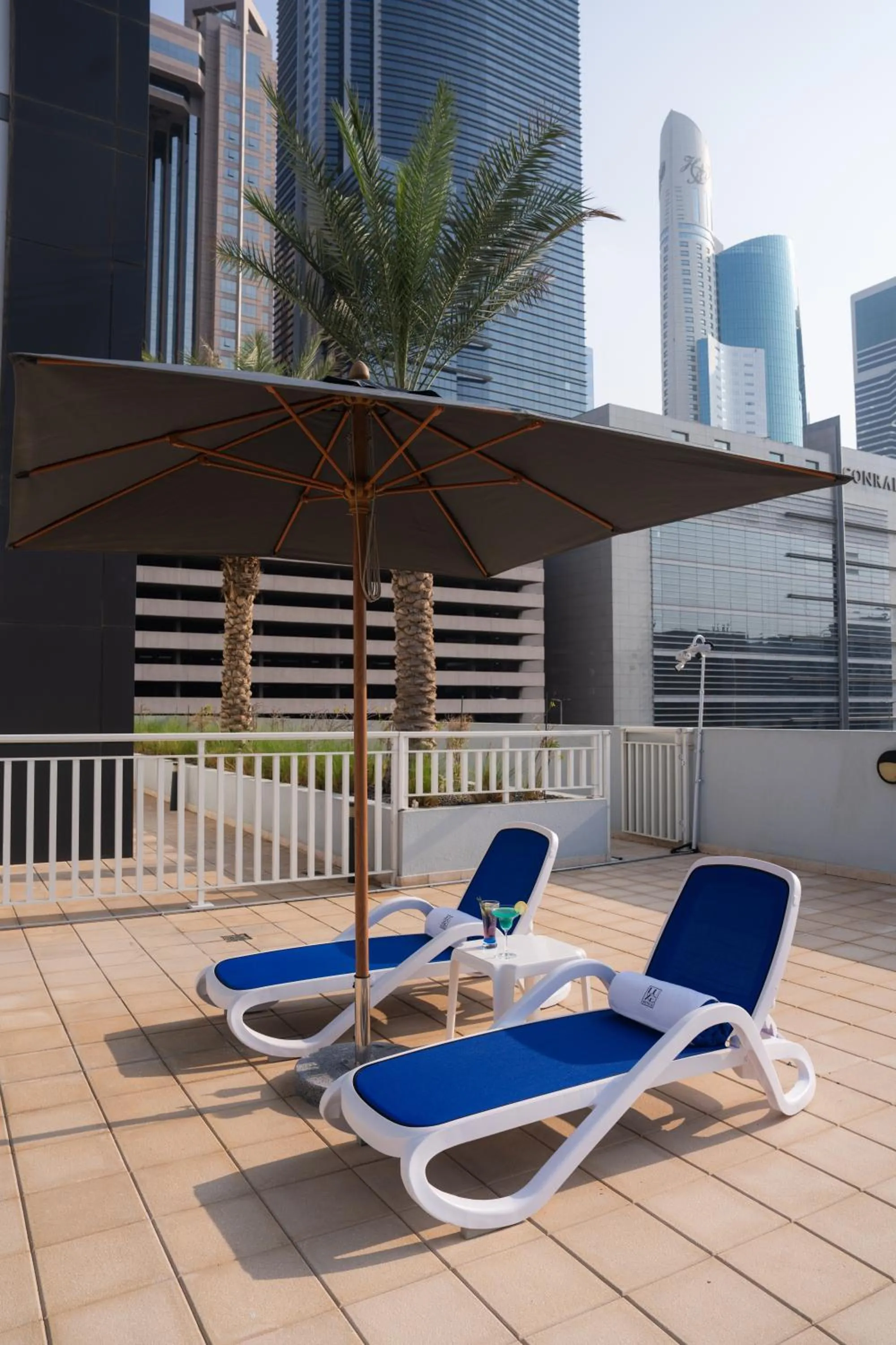 Swimming pool in The Luxe Retreat Hotel Apartments