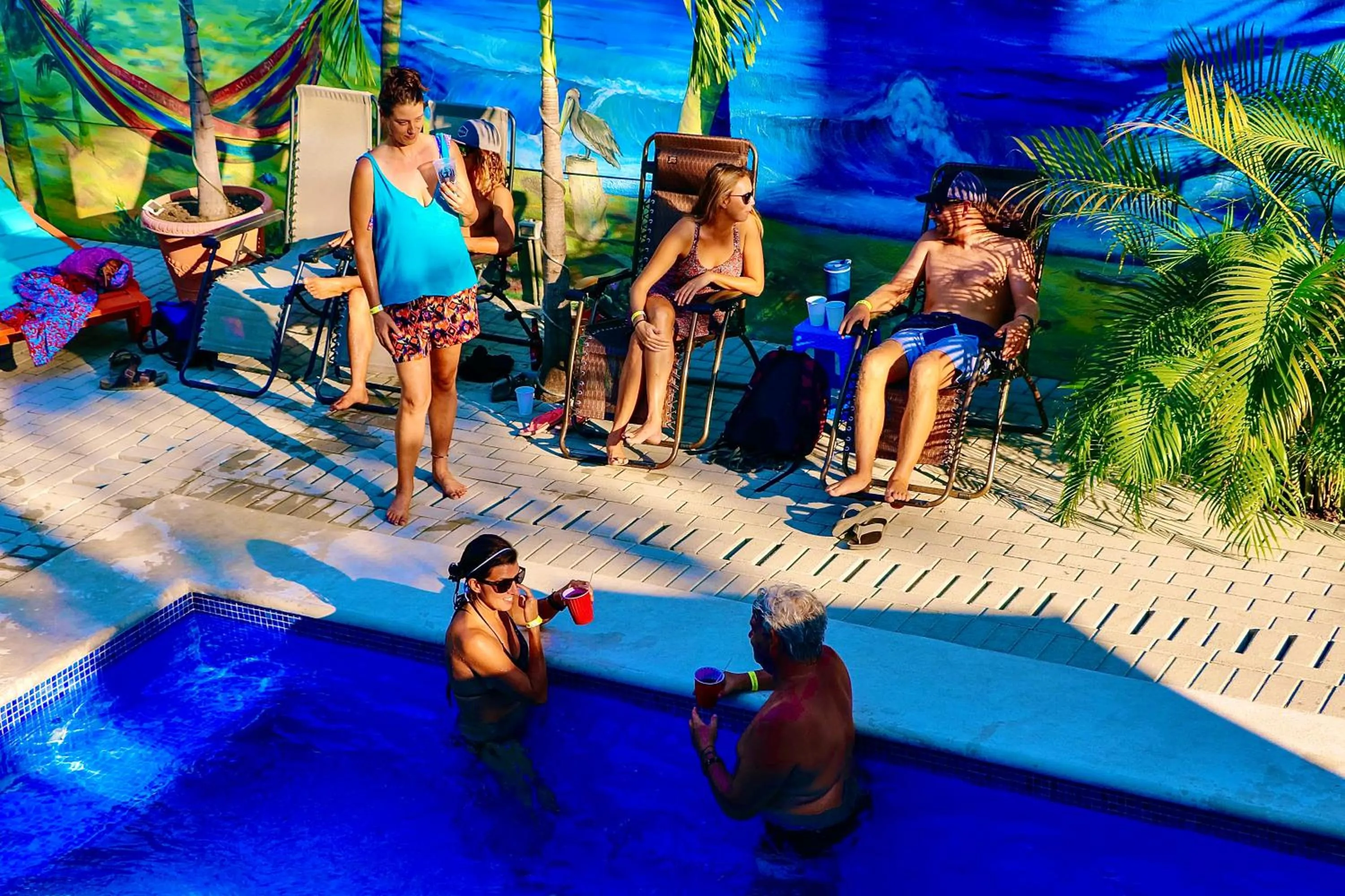 People in Blue Iguana