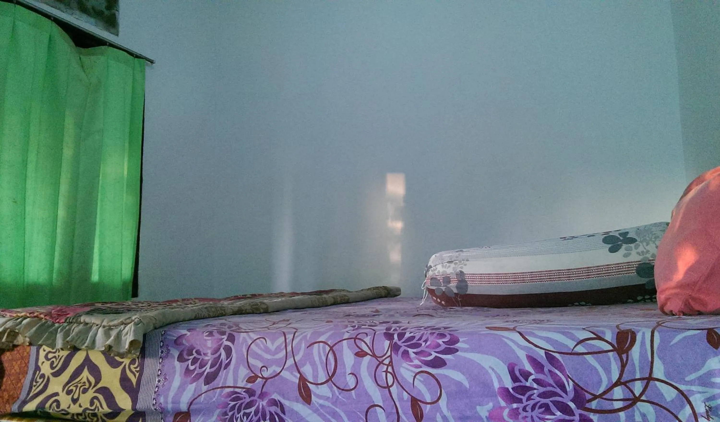 Bed in Diyah Homestay