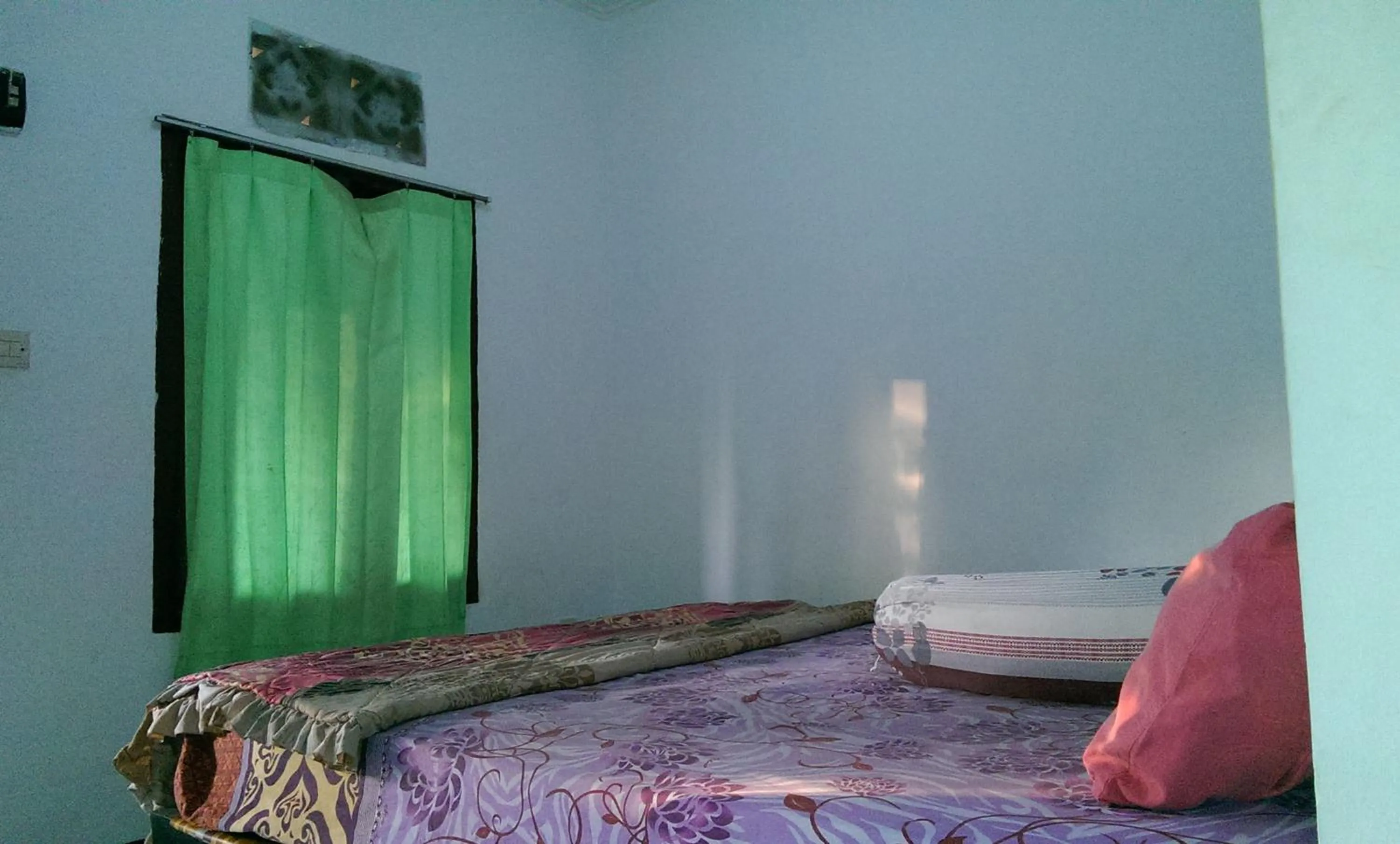 Bed in Diyah Homestay
