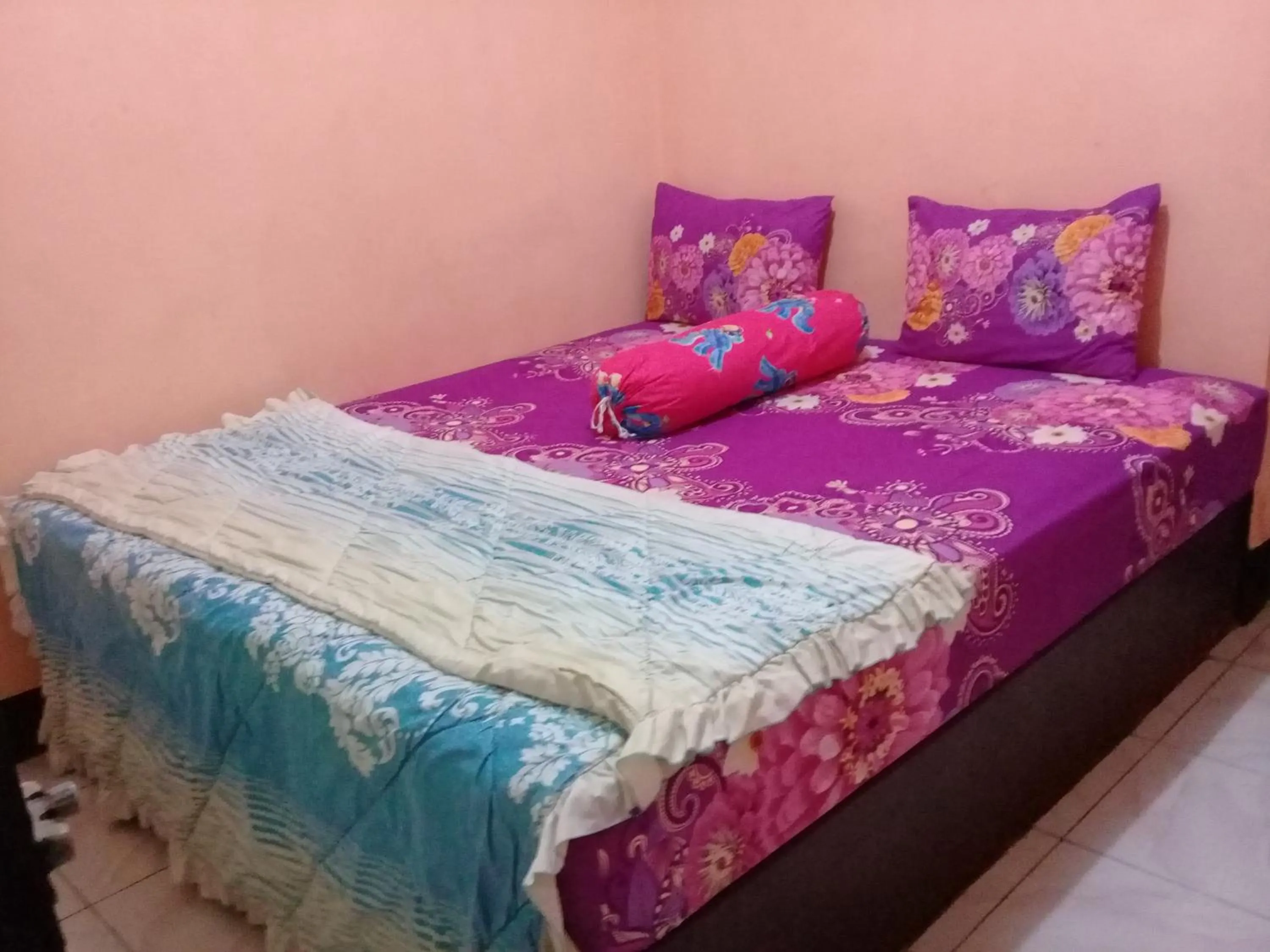 Bed in Diyah Homestay