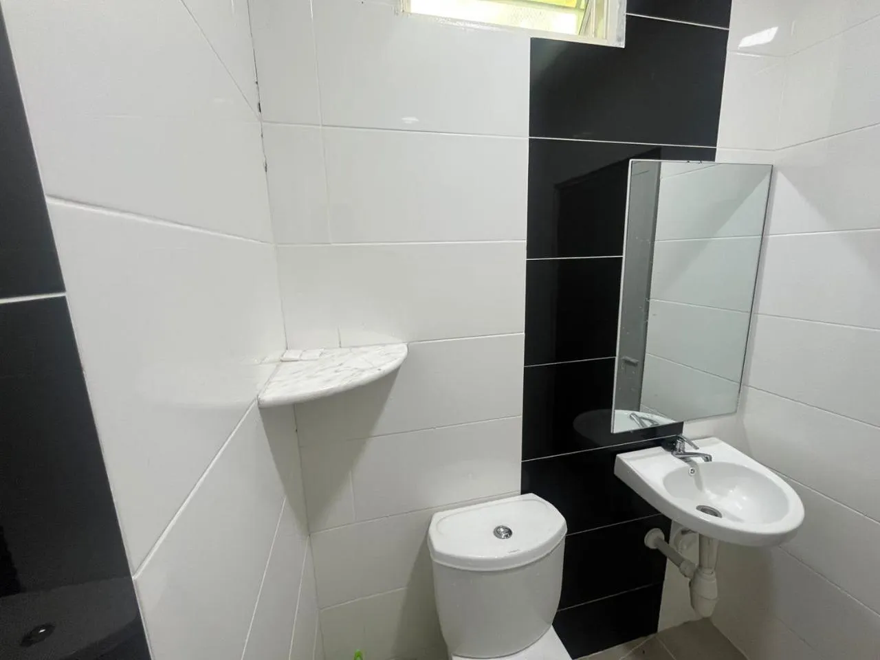 Bathroom in OYO 91220 D Inai Roomstay