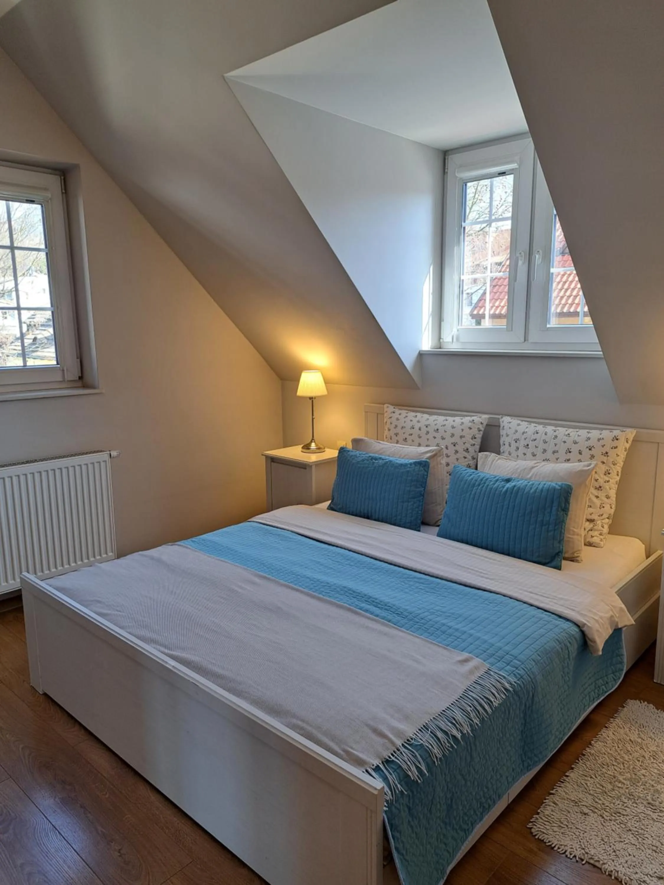 Bed in APARTAMENTY TUŹNIKOWIE