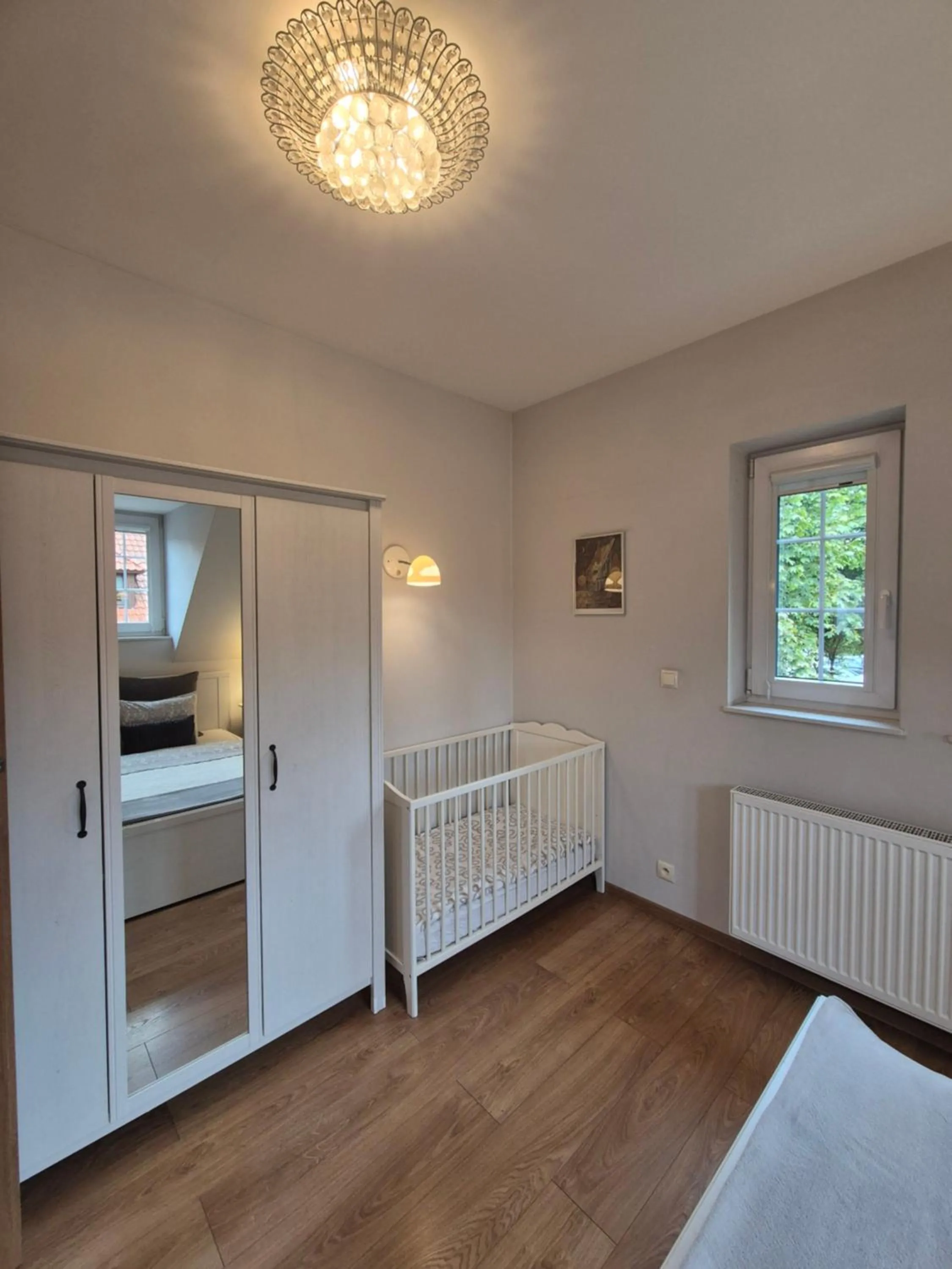 Bed in APARTAMENTY TUŹNIKOWIE