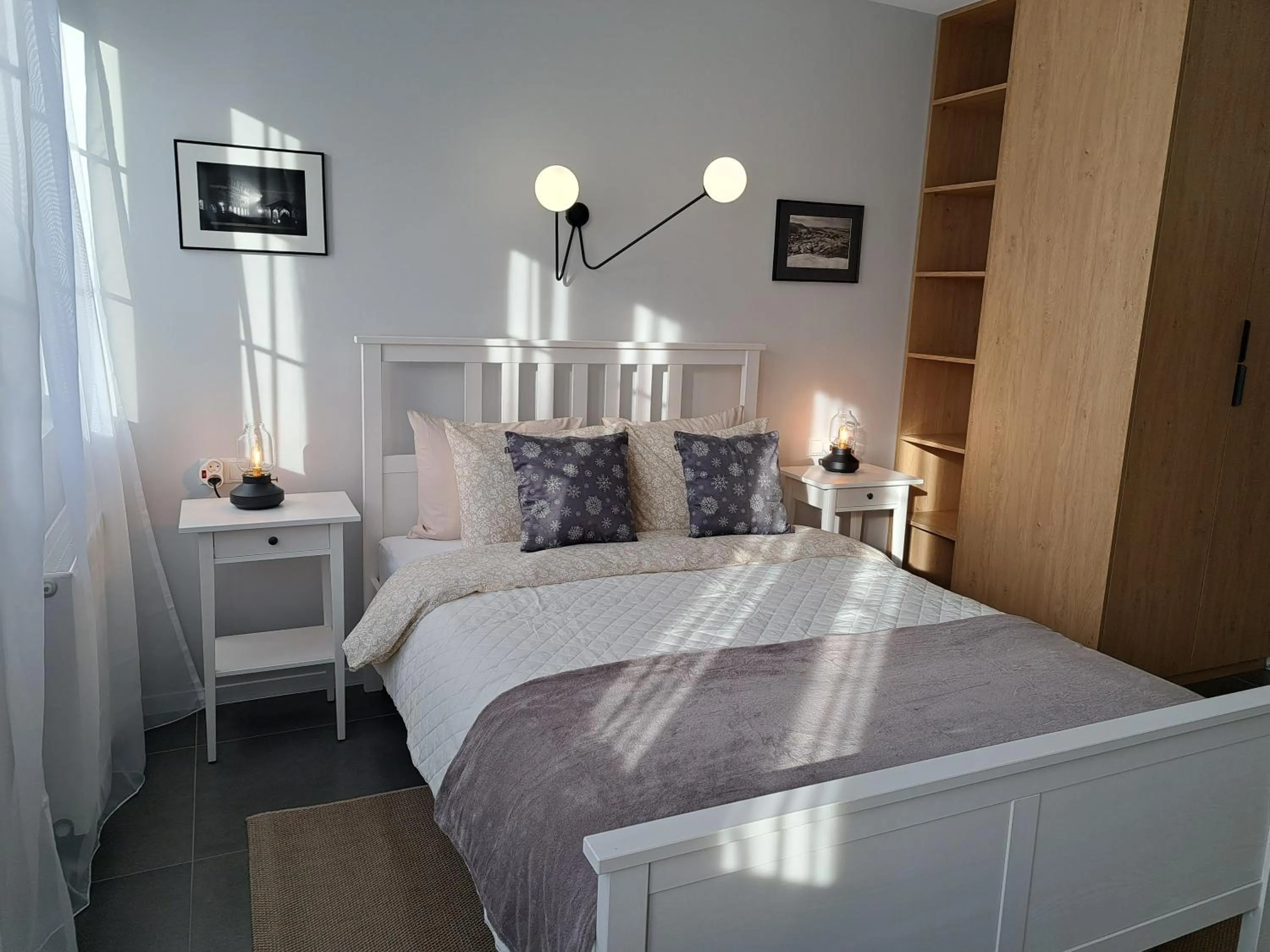 Bed in APARTAMENTY TUŹNIKOWIE
