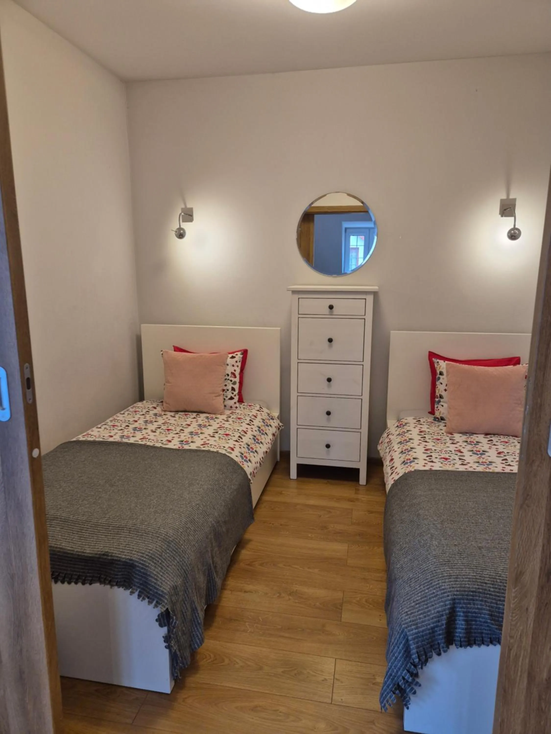 Bed in APARTAMENTY TUŹNIKOWIE