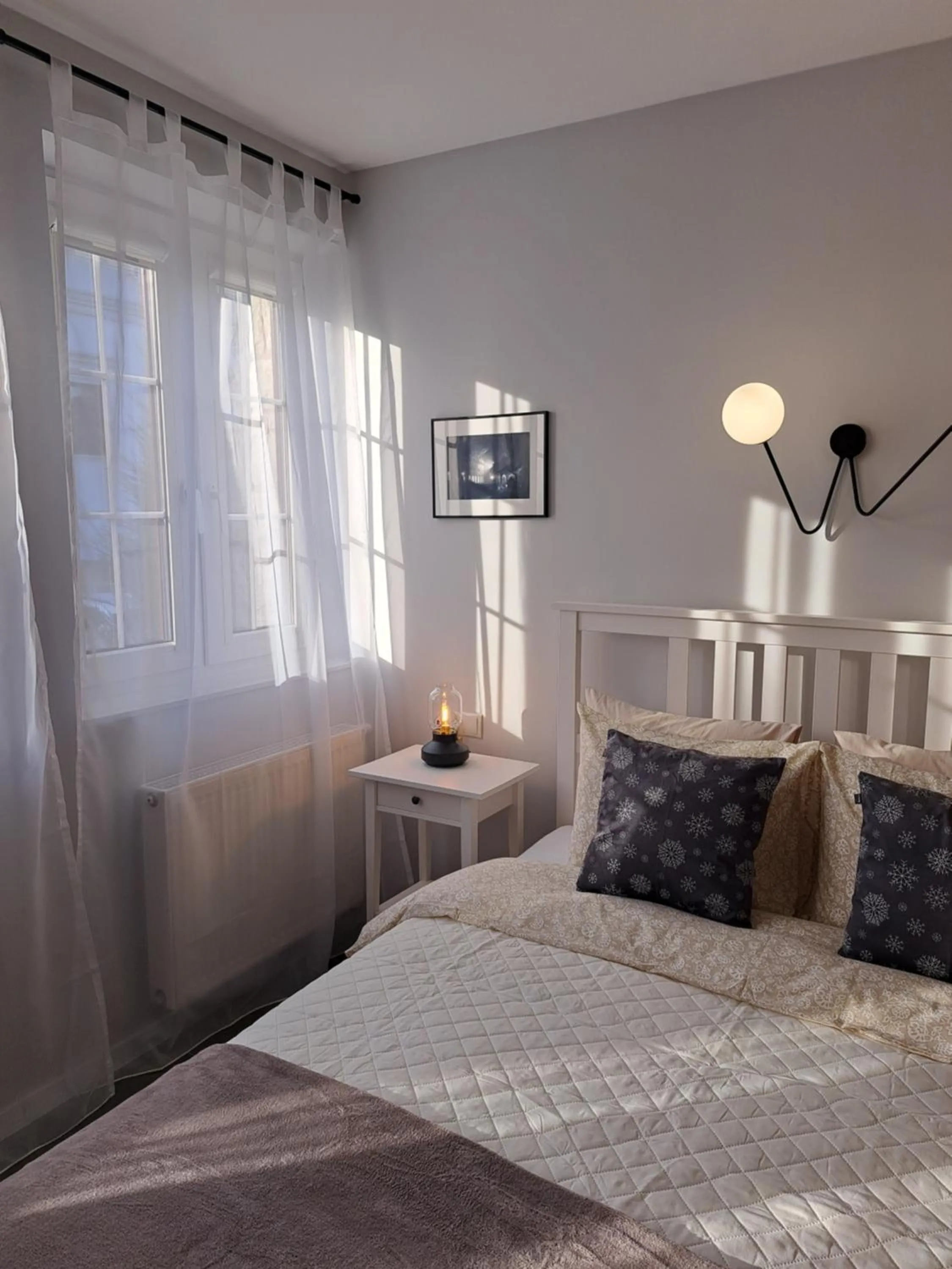 Bed in APARTAMENTY TUŹNIKOWIE