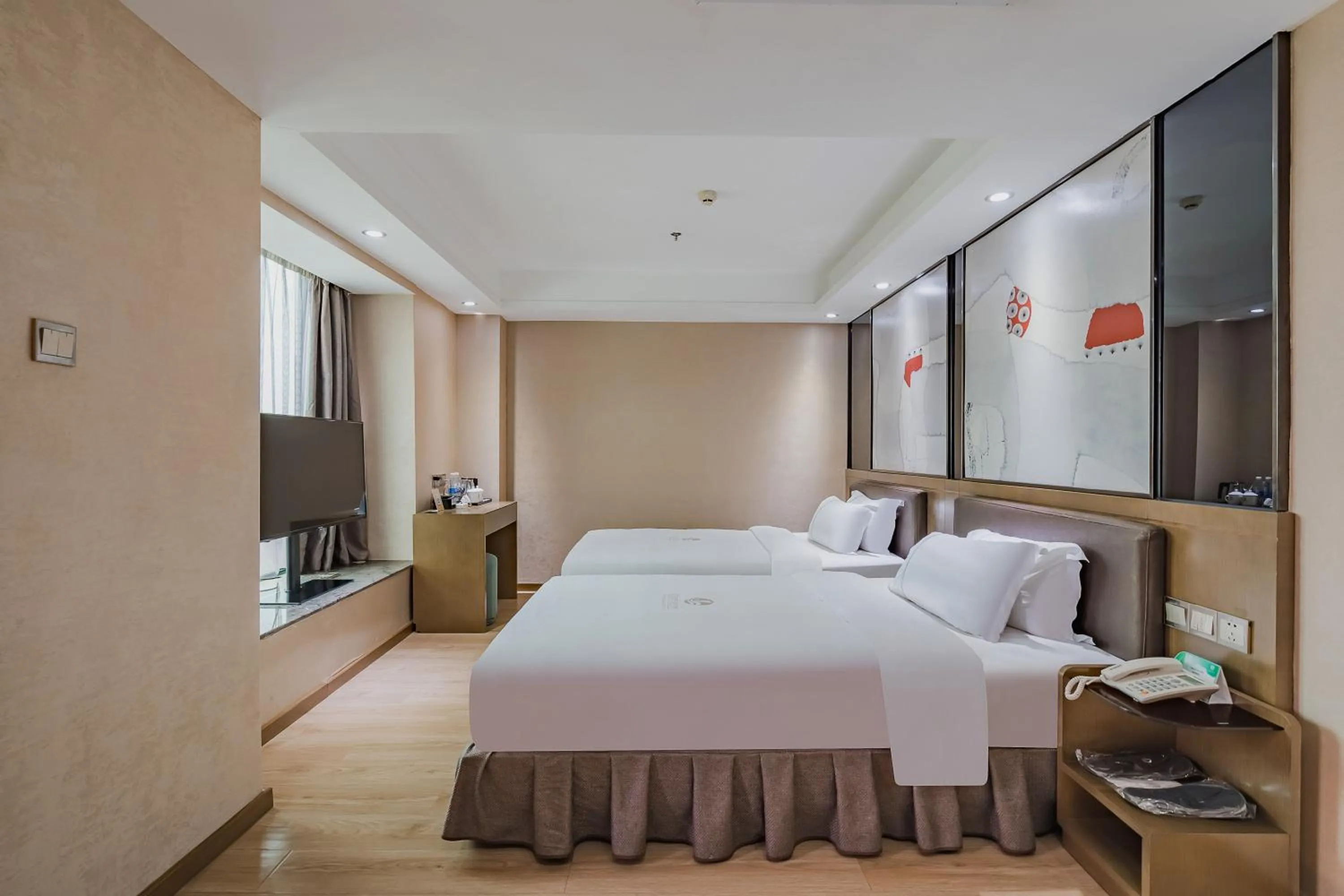 Photo of the whole room, Bed in Insail Hotels (Pazhou Exhibition Center KeCun Metro Station Dunhe Road Branch Guangzhou)