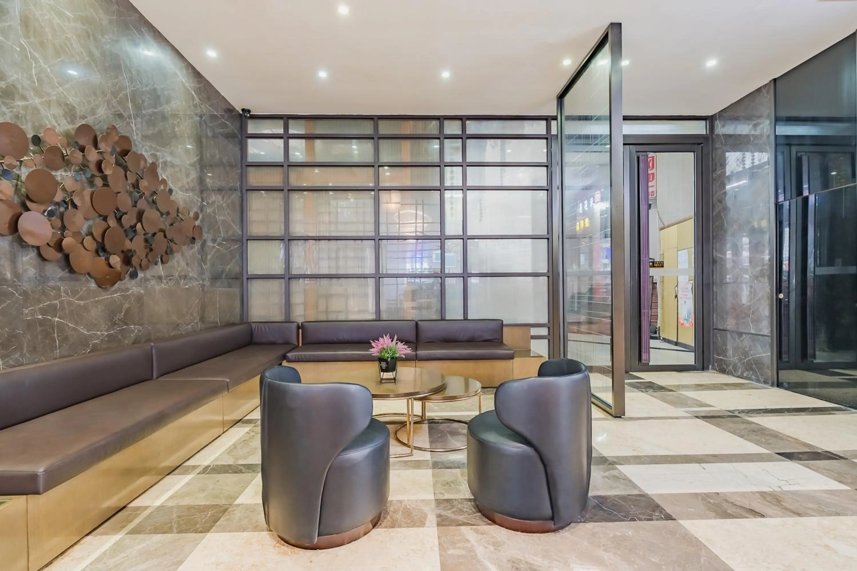 Seating area in Insail Hotels (Pazhou Exhibition Center KeCun Metro Station Dunhe Road Branch Guangzhou)