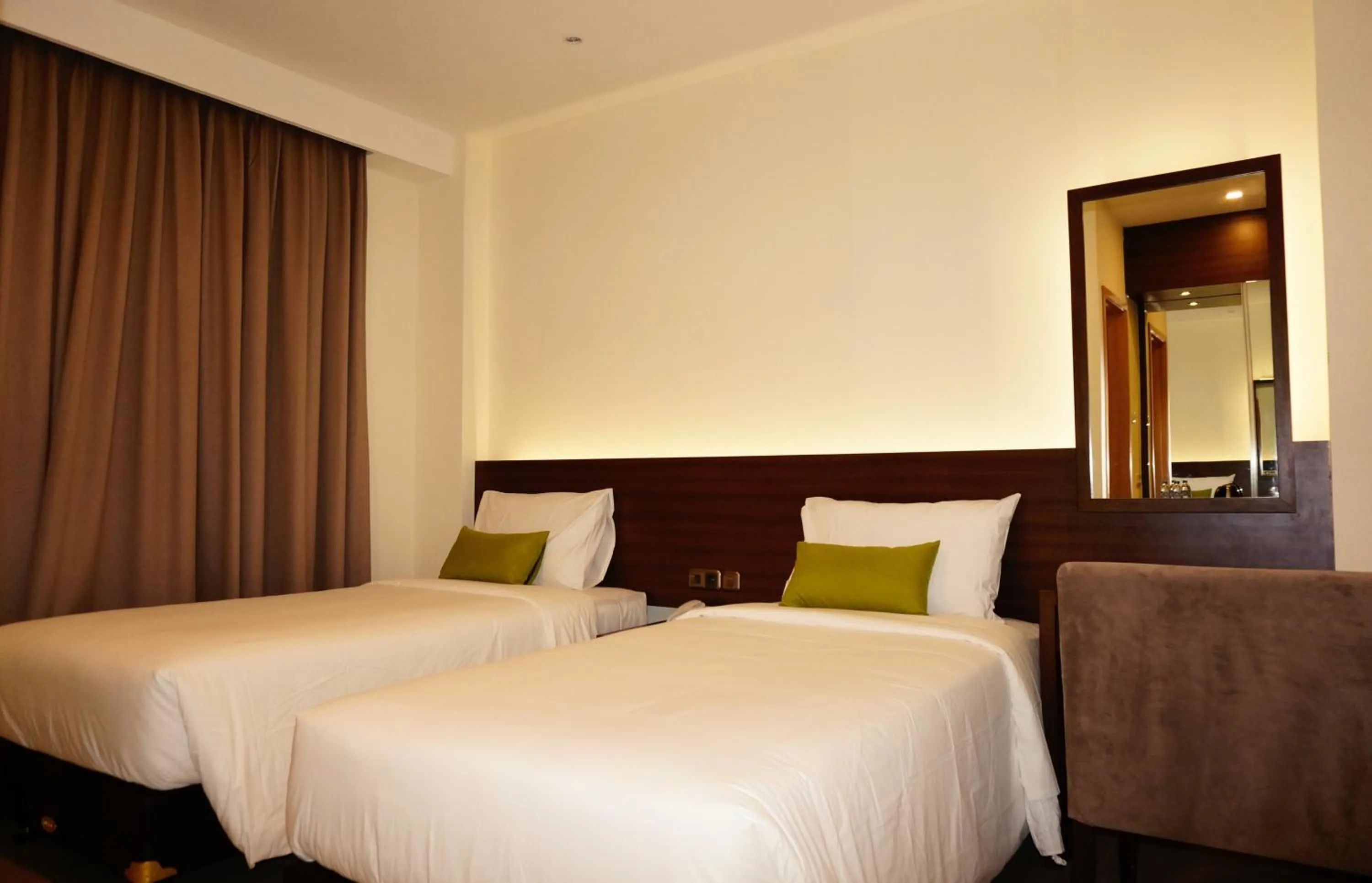 Bed in Green Eden Hotel