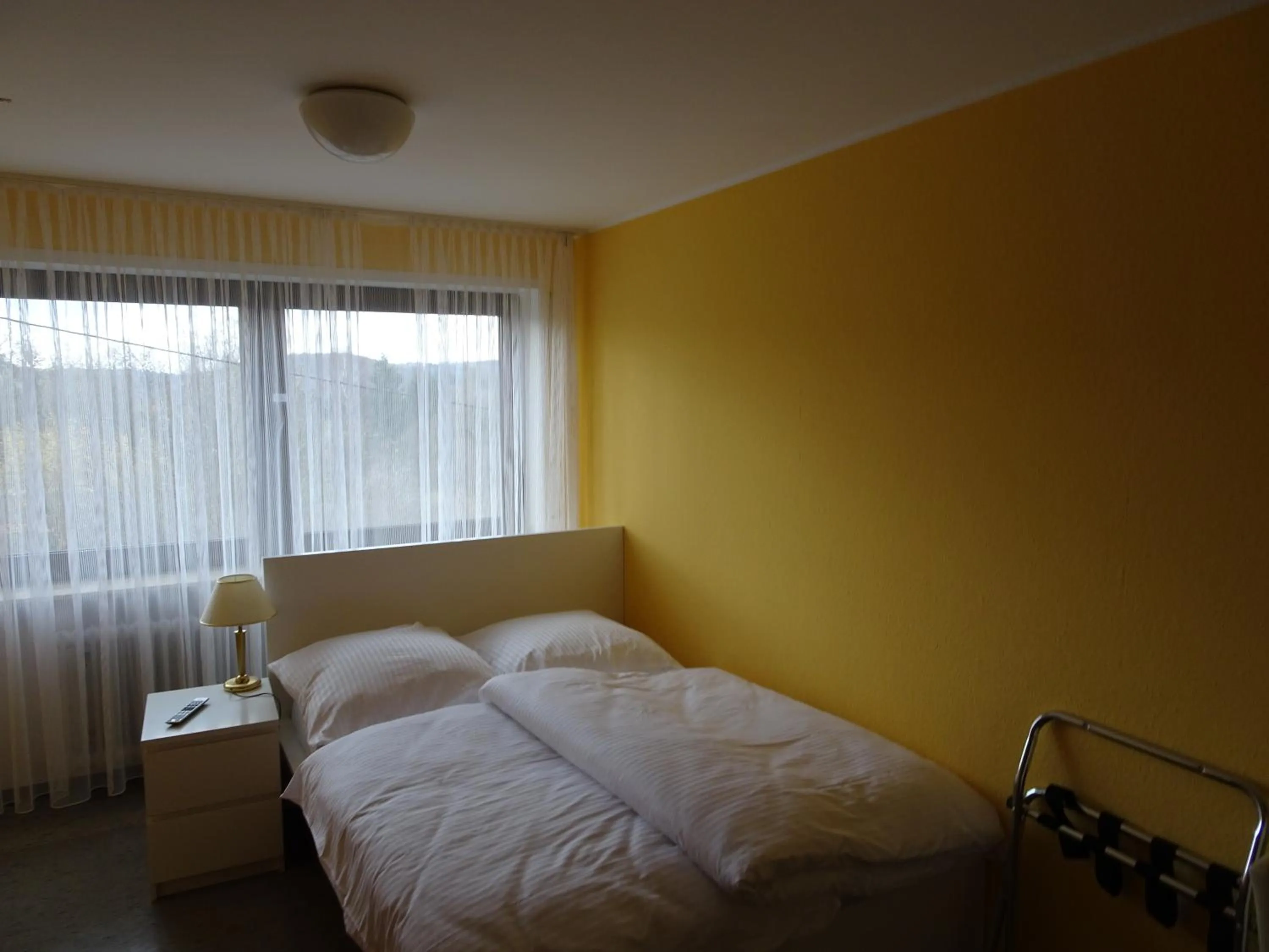 Photo of the whole room, Bed in Hotel-Pension Schlossgarten