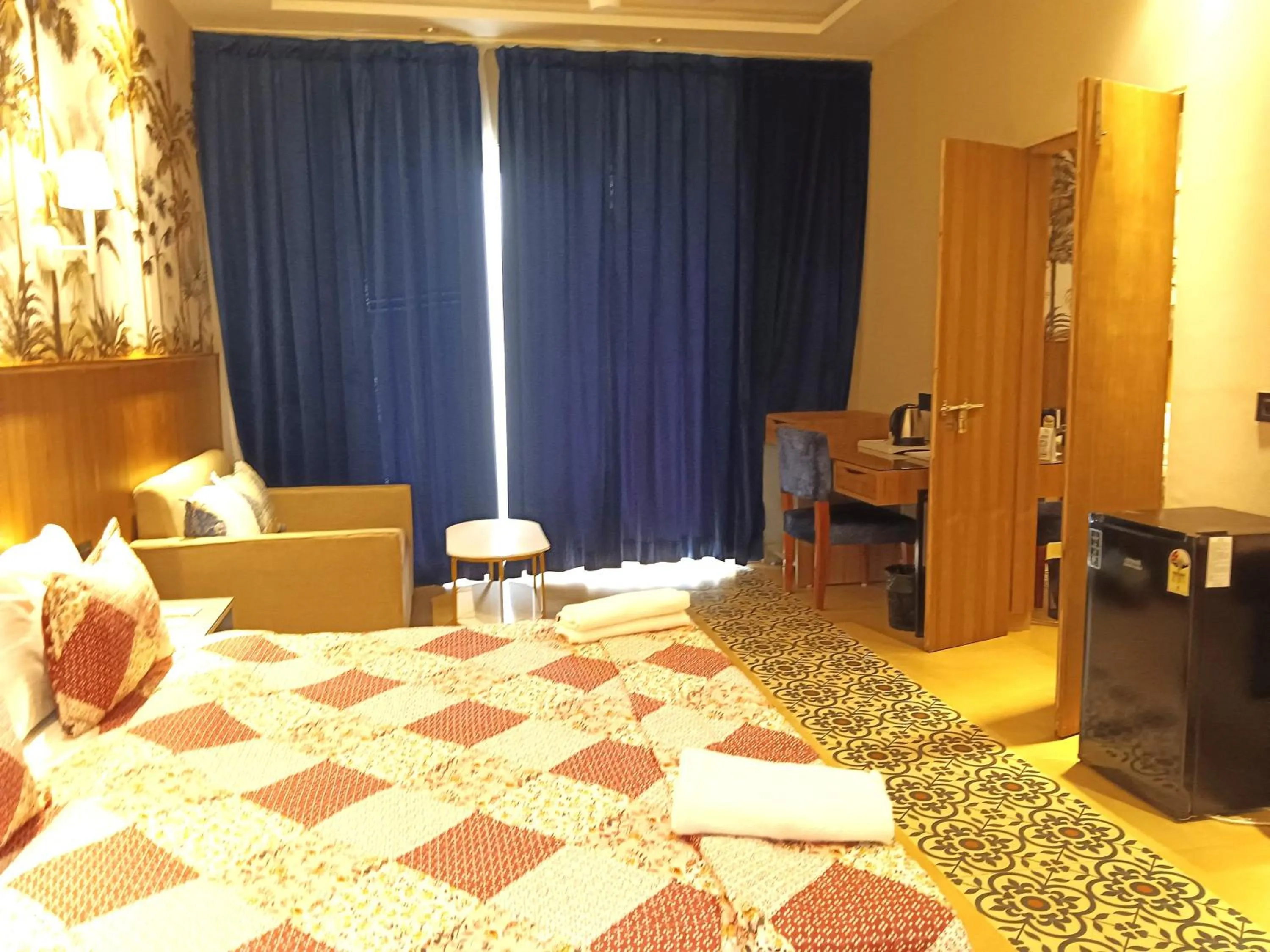 Bed in Eutopia Beach Resort