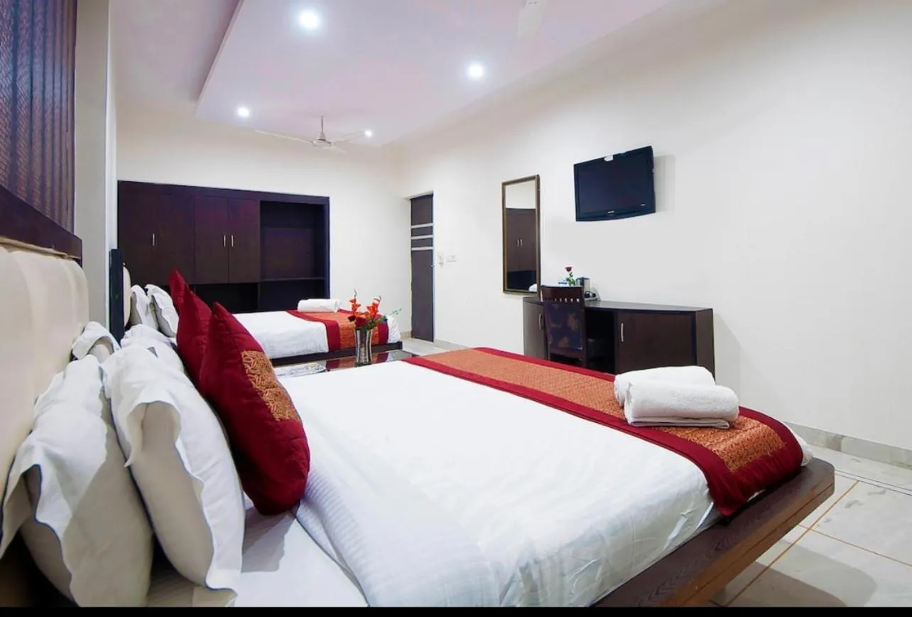 Bed in Eutopia Beach Resort