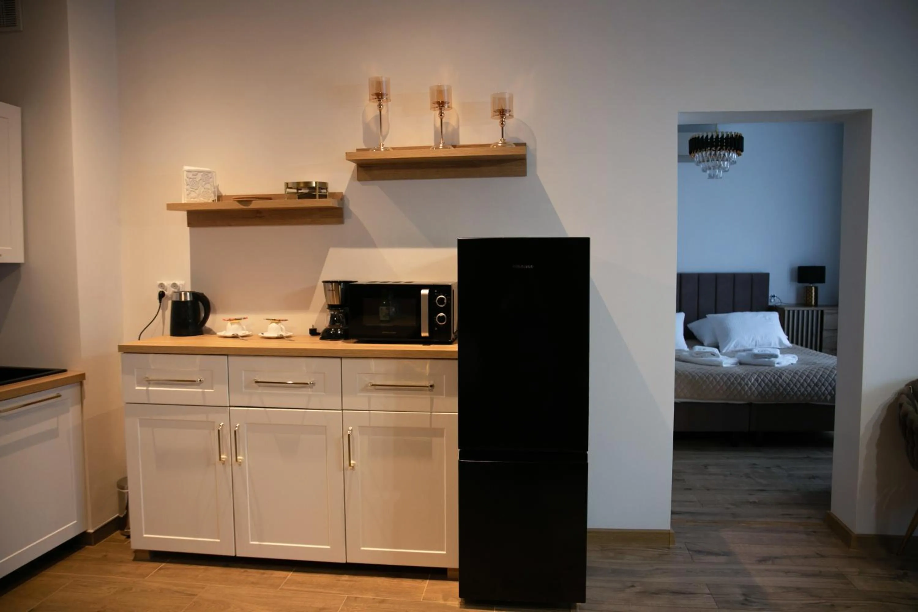 Kitchen or kitchenette, Bed in Hotel Piast