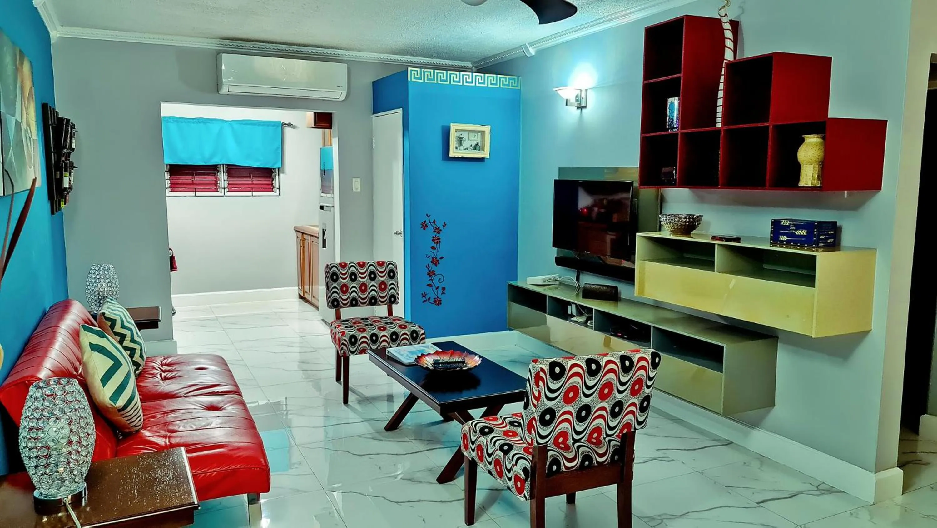 Communal lounge/ TV room in Casa Alexandria Guest Apartment