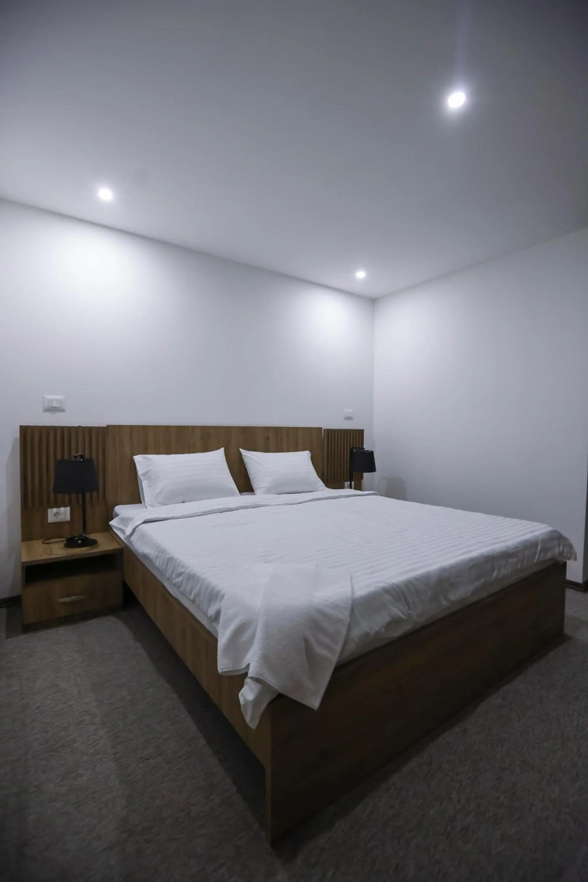 Bed in Hotel Riverside