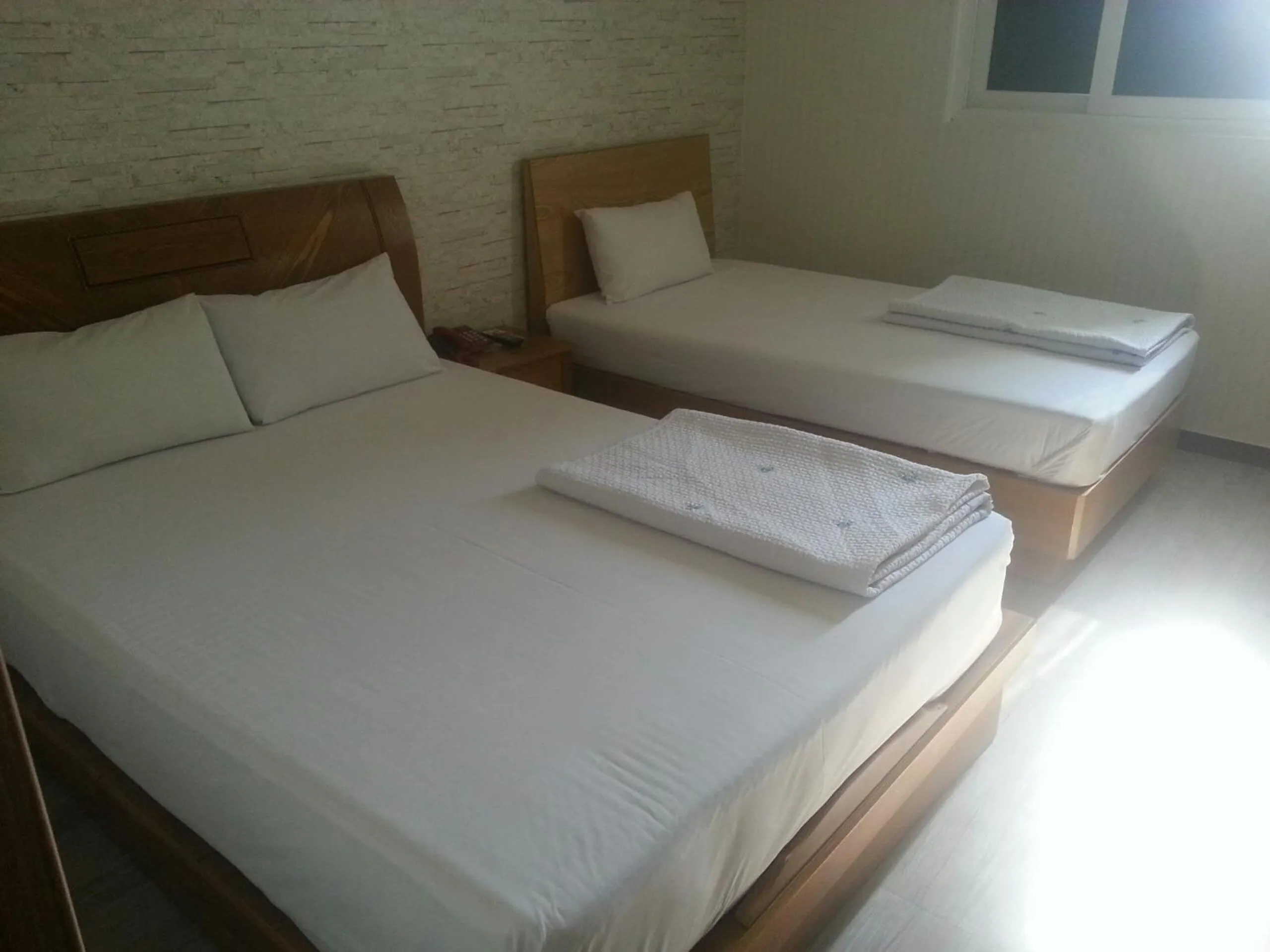 Bedroom, Bed in Hansol Hotel