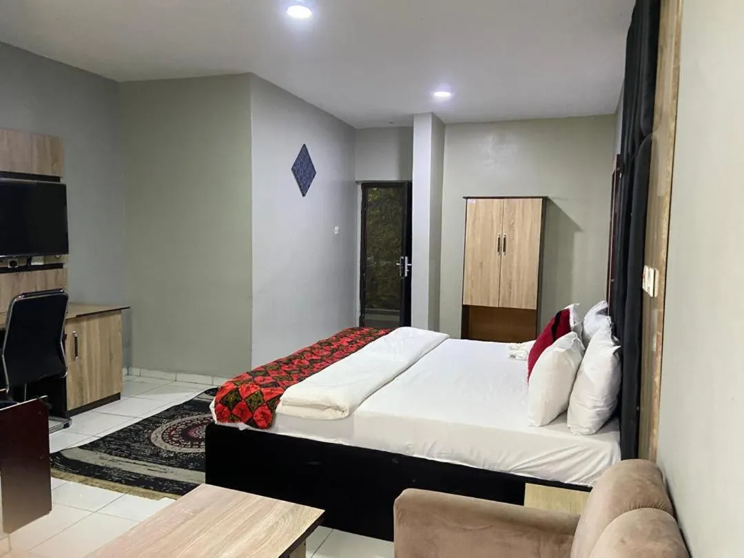 Bed in Leadwort Hotel