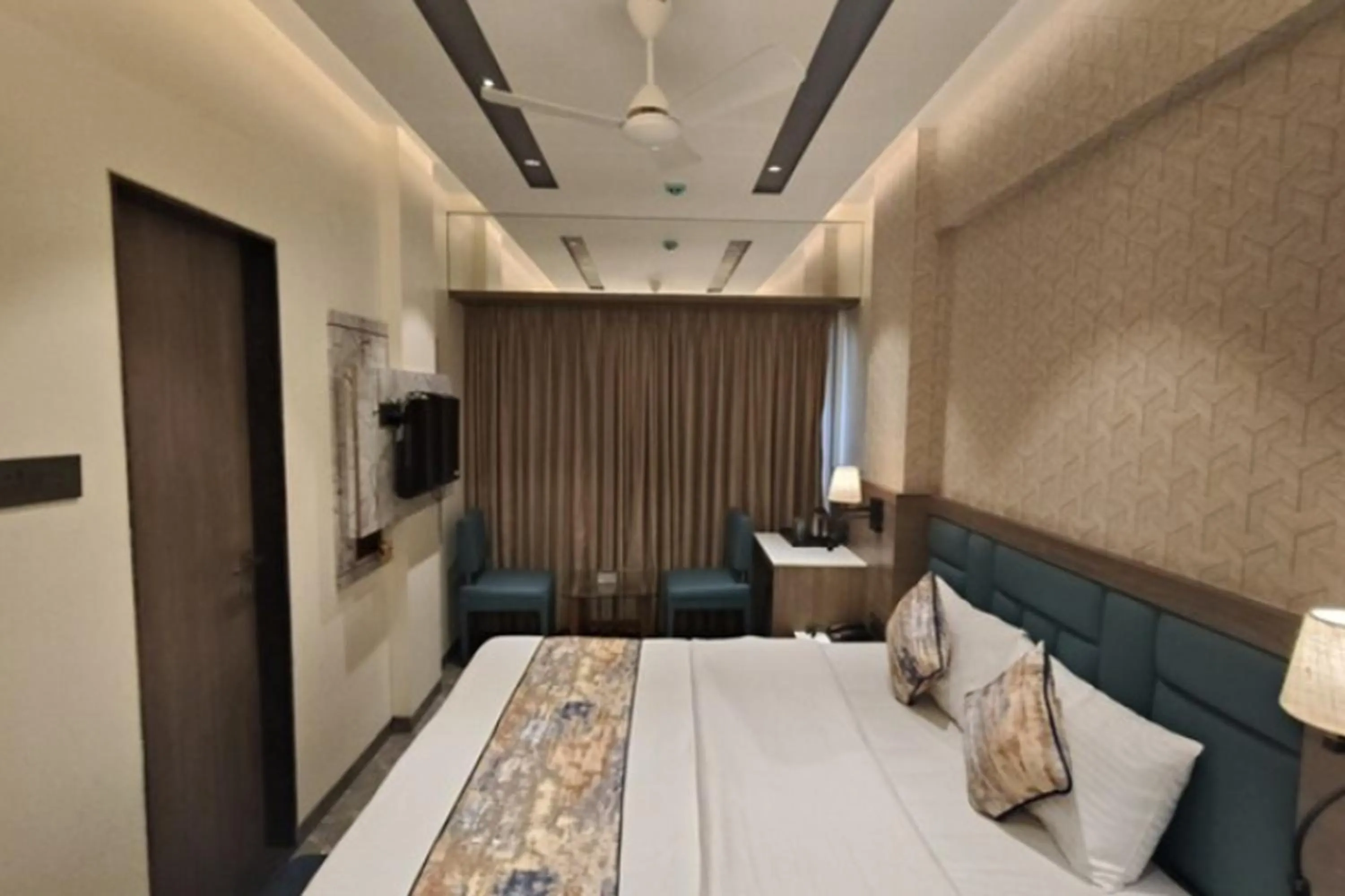 Bed in Dream Residency Hotels Pvt Ltd