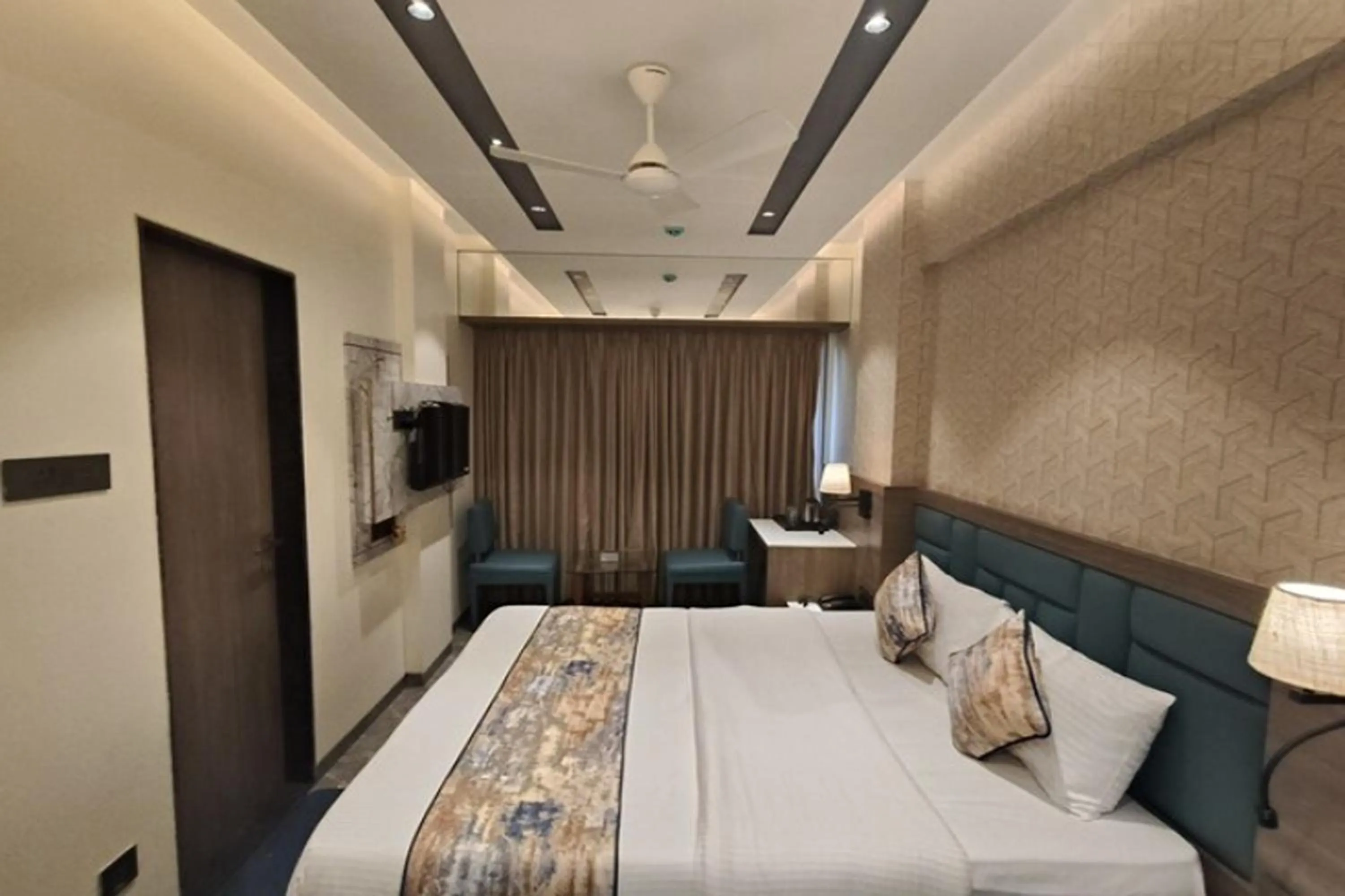 Bed in Dream Residency Hotels Pvt Ltd