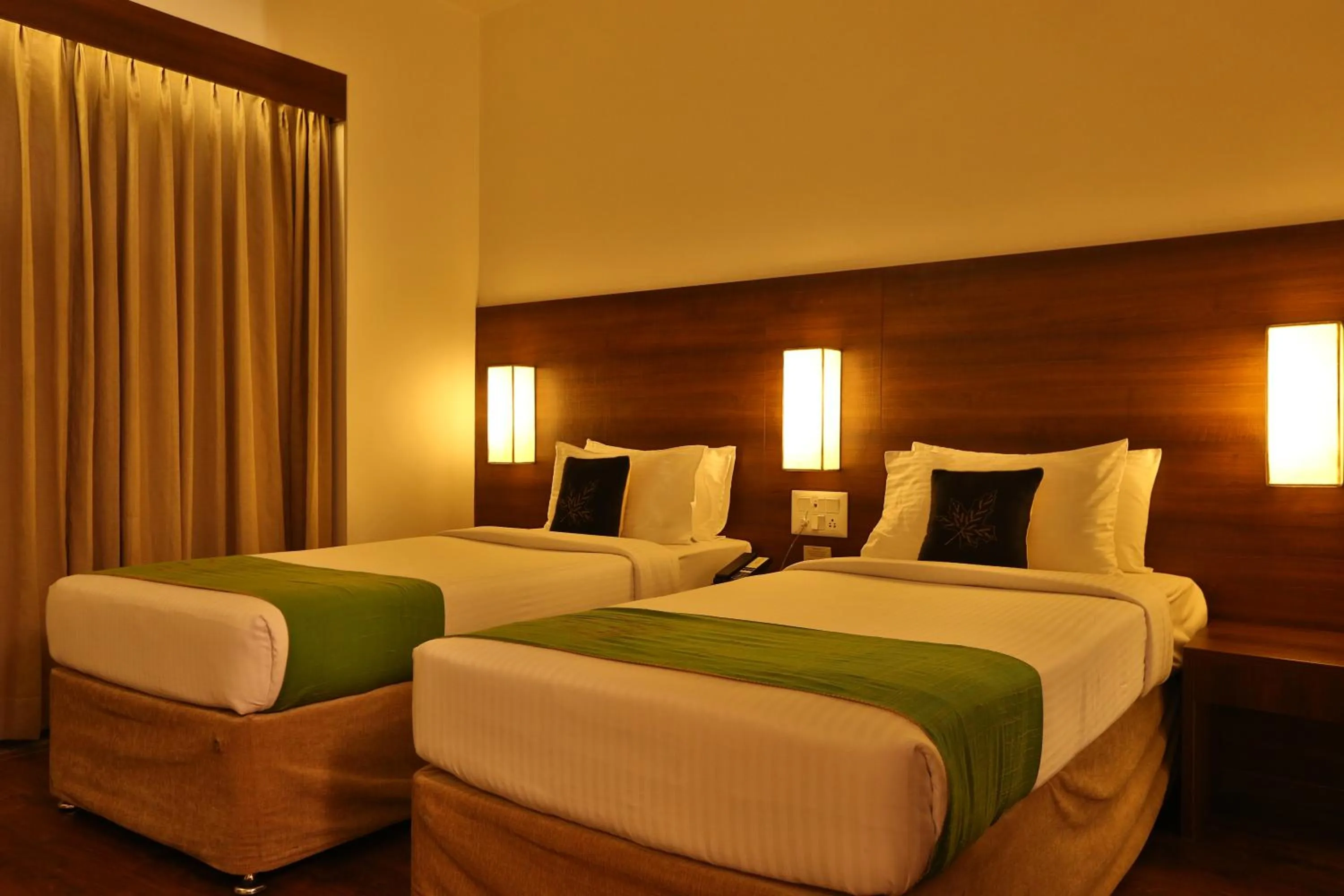 Bed in Temple Tree Hotel