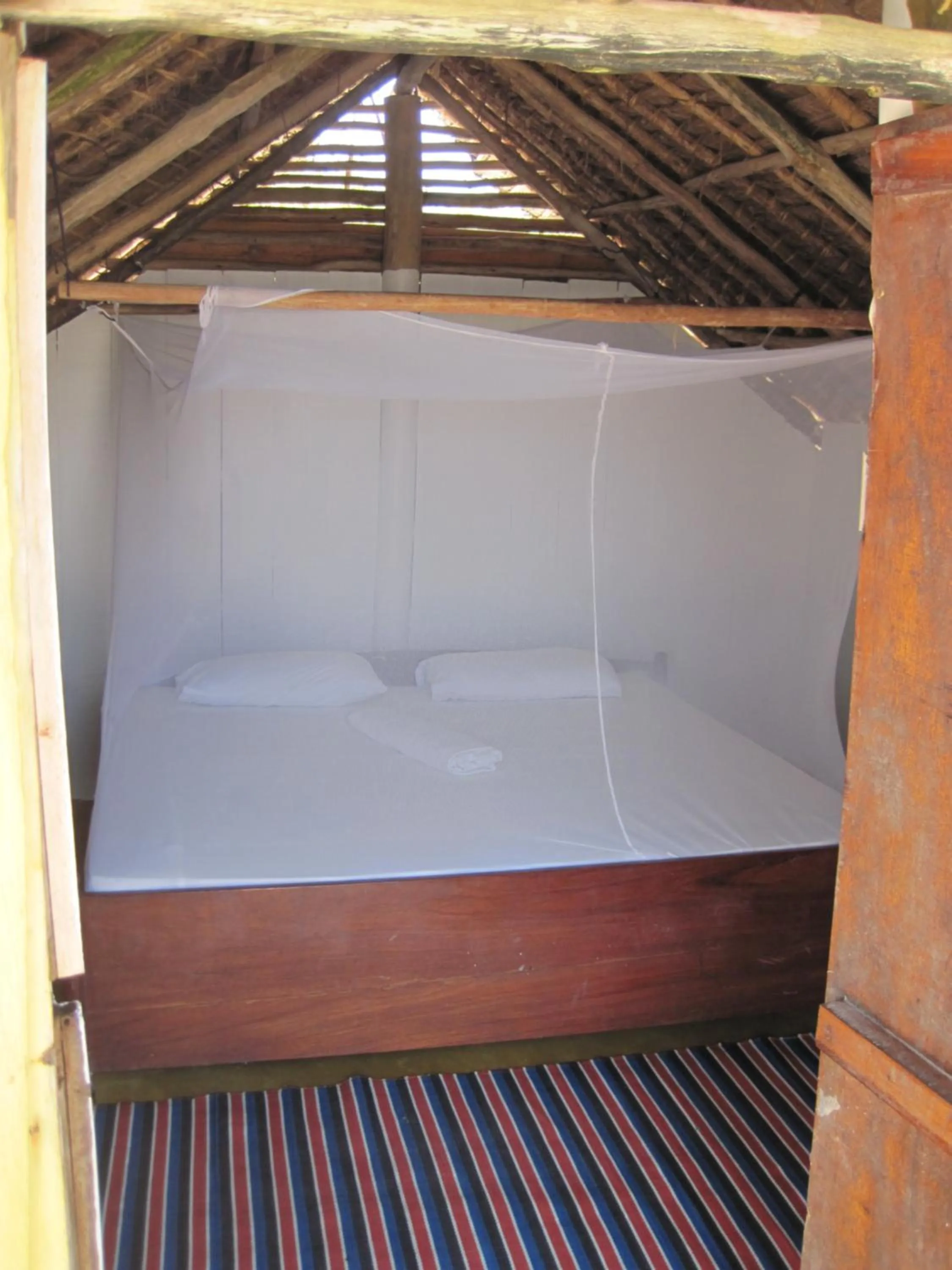 Bed in Kipepeo Beach and Village