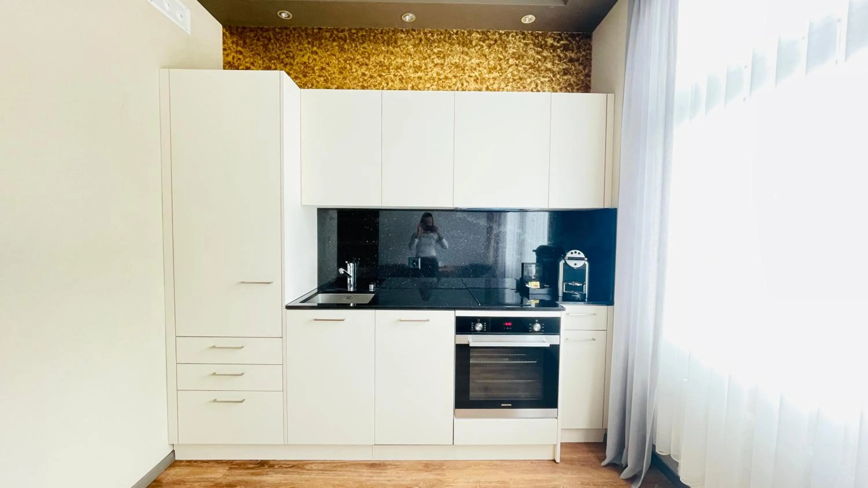 Kitchen or kitchenette in Plaza Hotel Winterthur