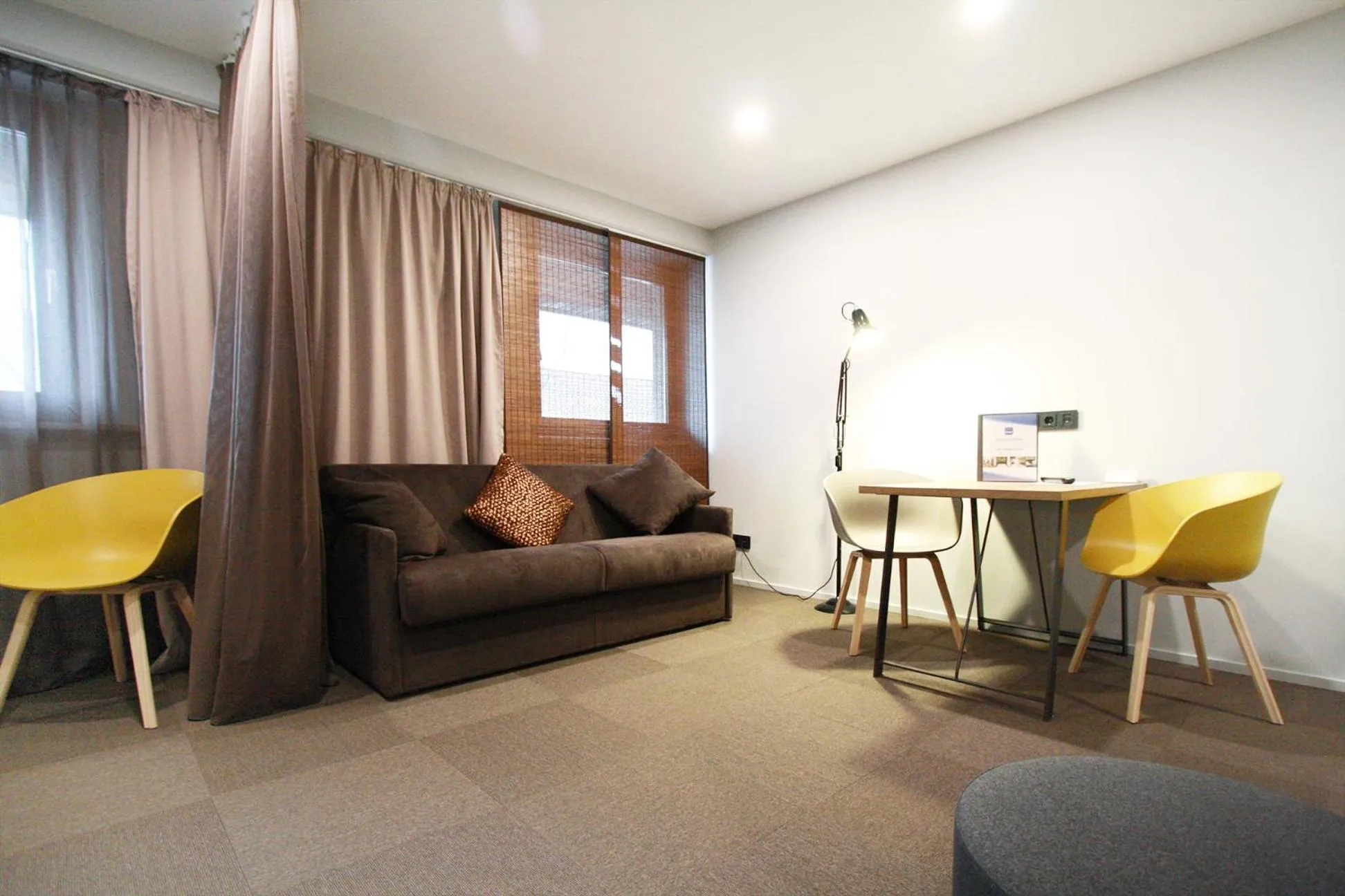 Living room in ARRIVEL Hotel Kirchheim - bisher Novitel