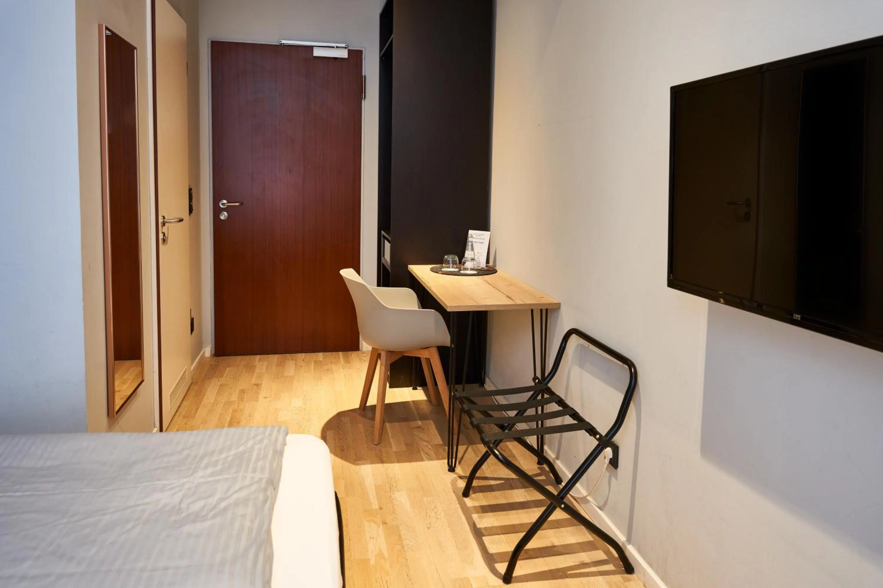 Photo of the whole room, Bed in ARRIVEL Hotel Kirchheim - bisher Novitel