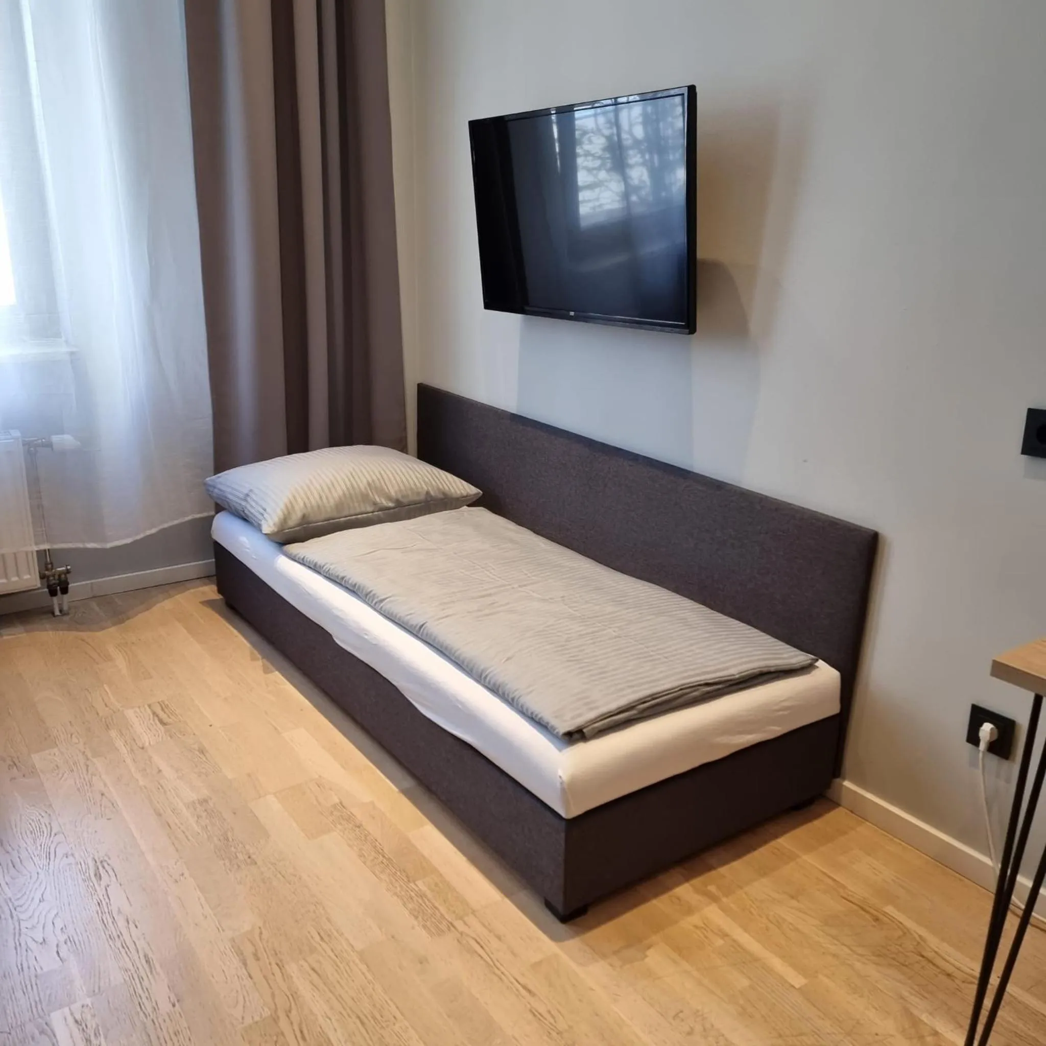 Photo of the whole room, Bed in ARRIVEL Hotel Kirchheim - bisher Novitel