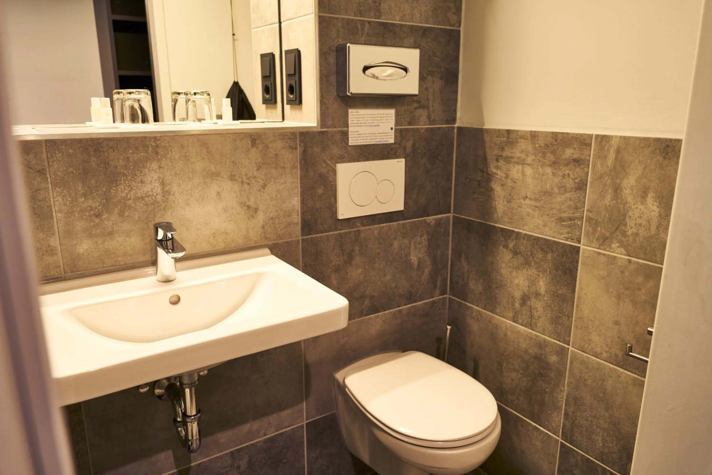 Bathroom in ARRIVEL Hotel Kirchheim - bisher Novitel
