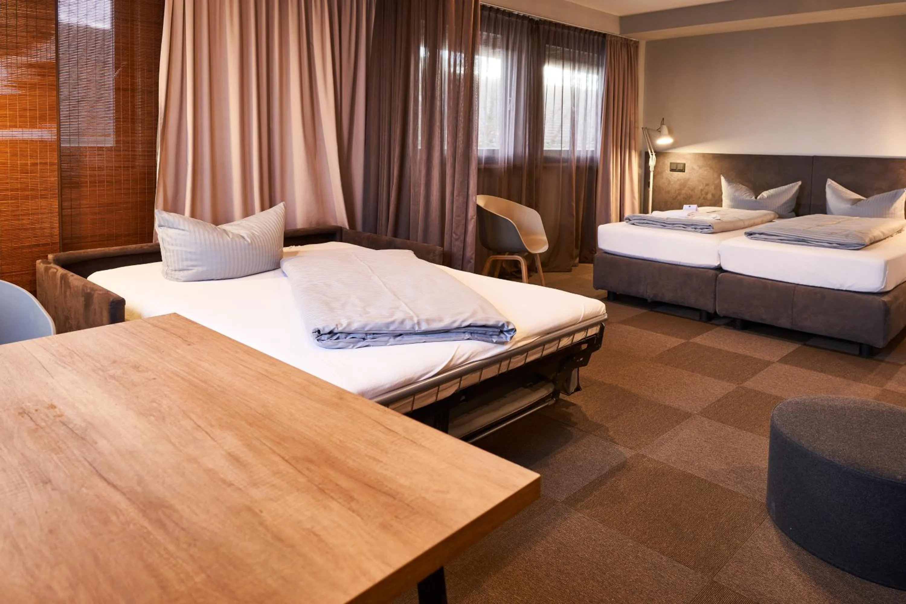 Photo of the whole room, Bed in ARRIVEL Hotel Kirchheim - bisher Novitel
