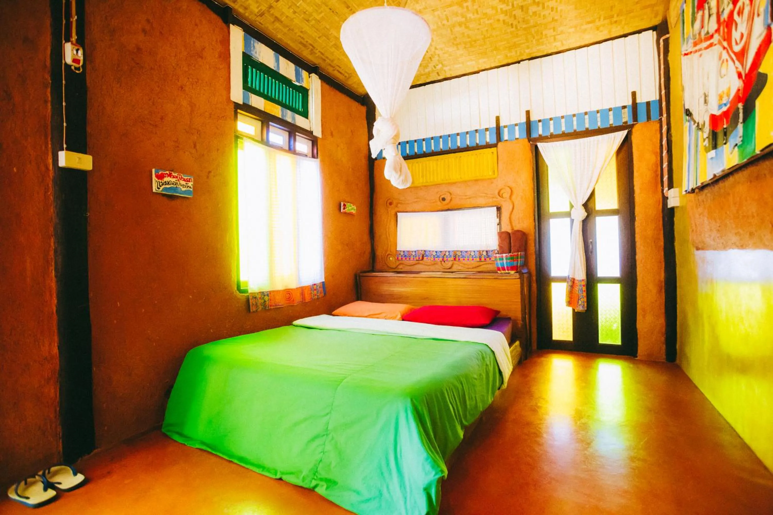 Bed in Sawasdeepai River Resort