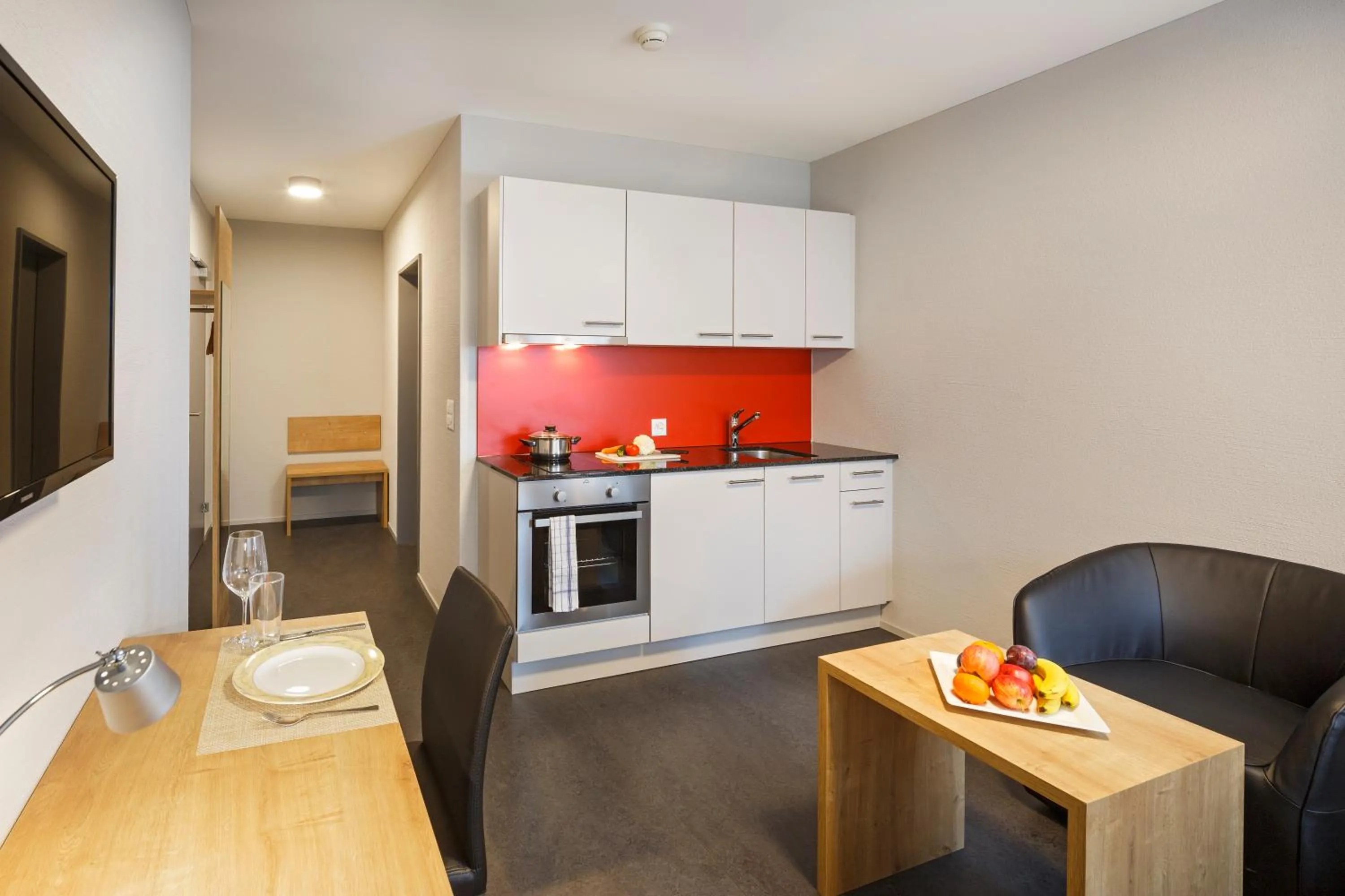 Kitchen or kitchenette in Aparthotel-aarau-WEST Swiss Quality