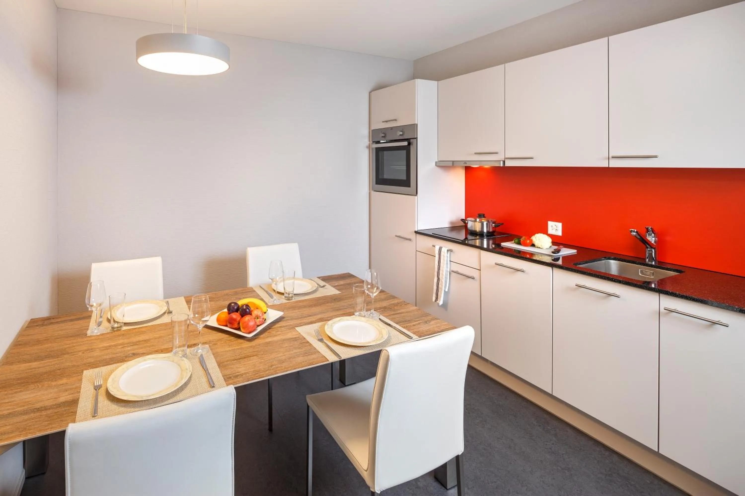 Kitchen or kitchenette in Aparthotel-aarau-WEST Swiss Quality