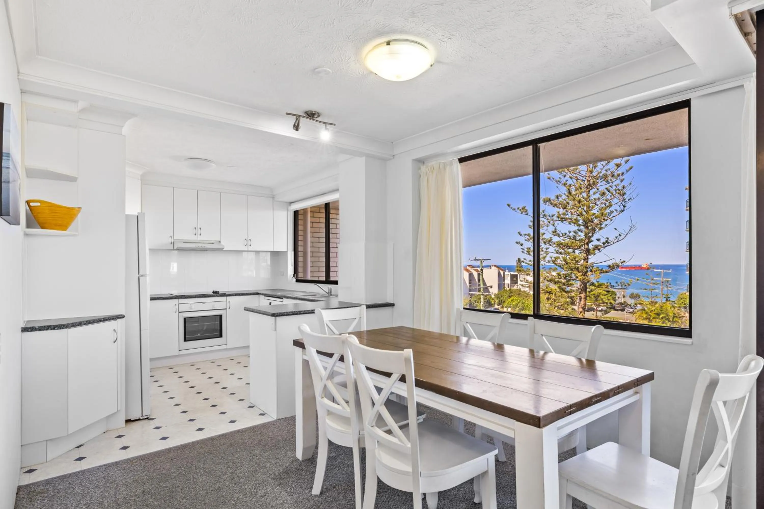 Kitchen or kitchenette in Burgess @ Kings Beach Apartments