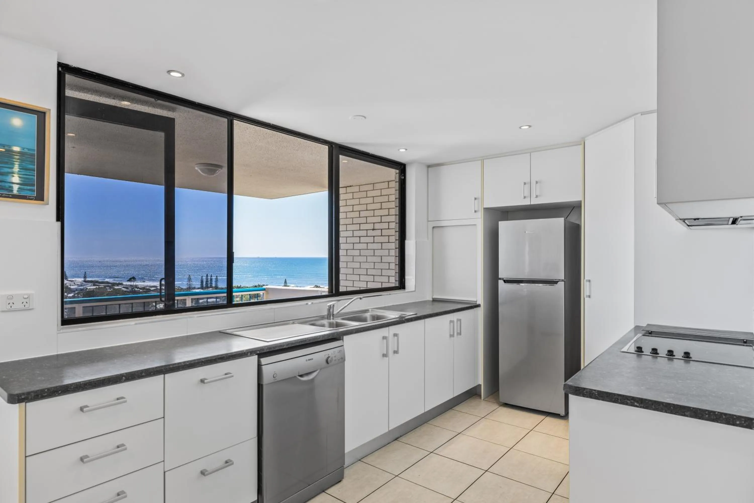 Kitchen or kitchenette in Burgess @ Kings Beach Apartments