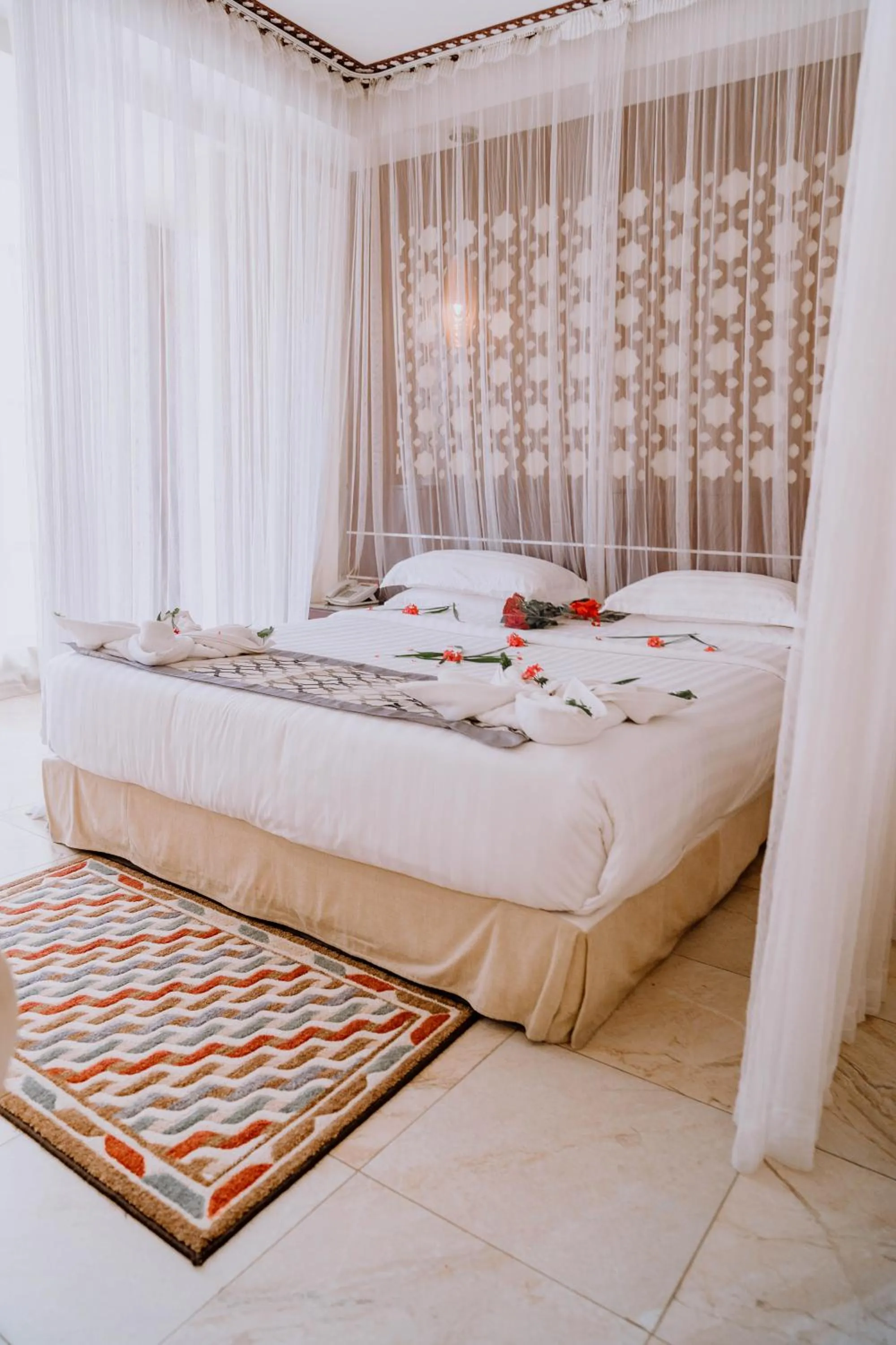 Bed in Saab Royale Hotel